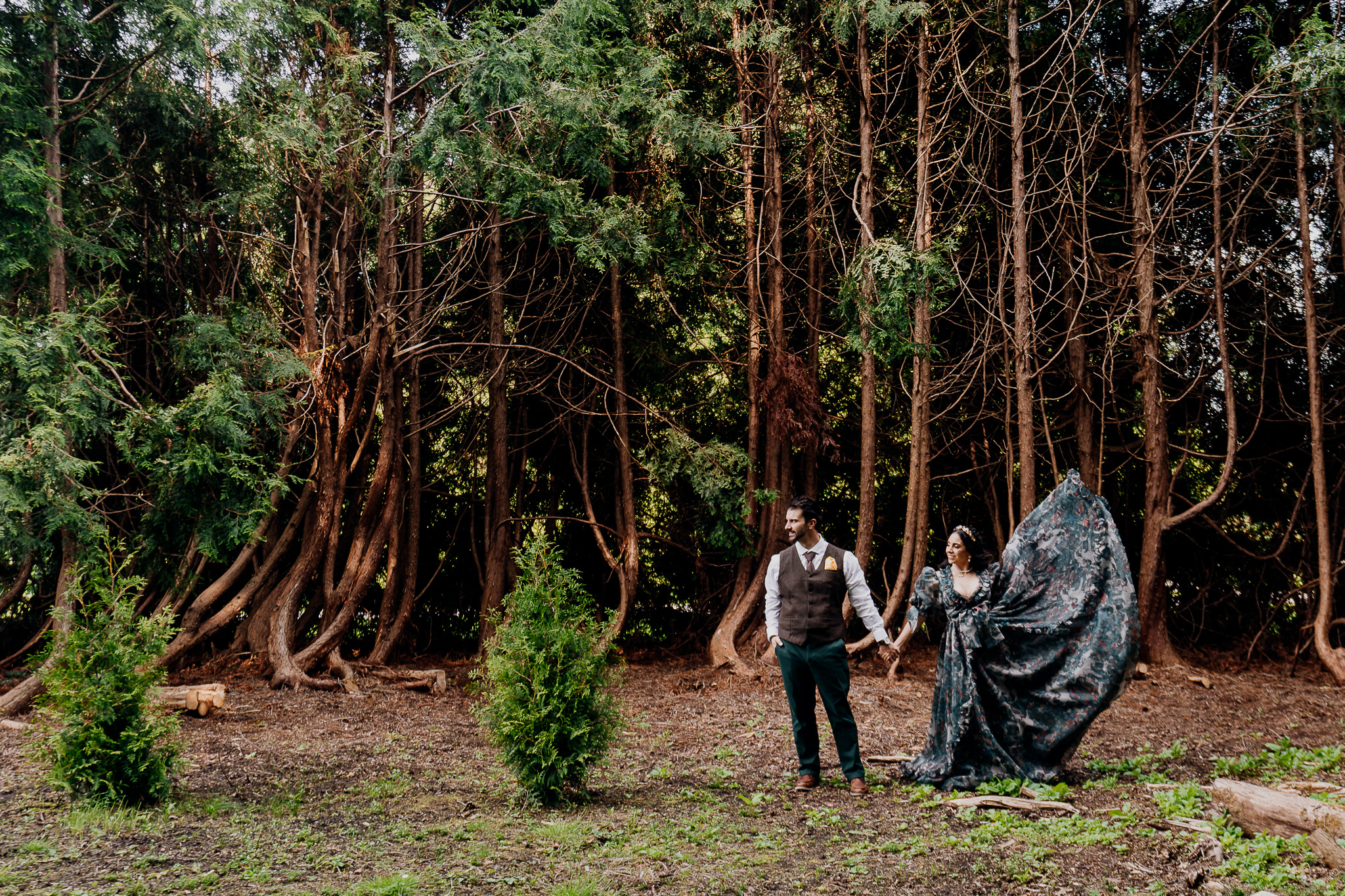 Couple walking through the woodlands during a pre-wedding session at Markree Castle