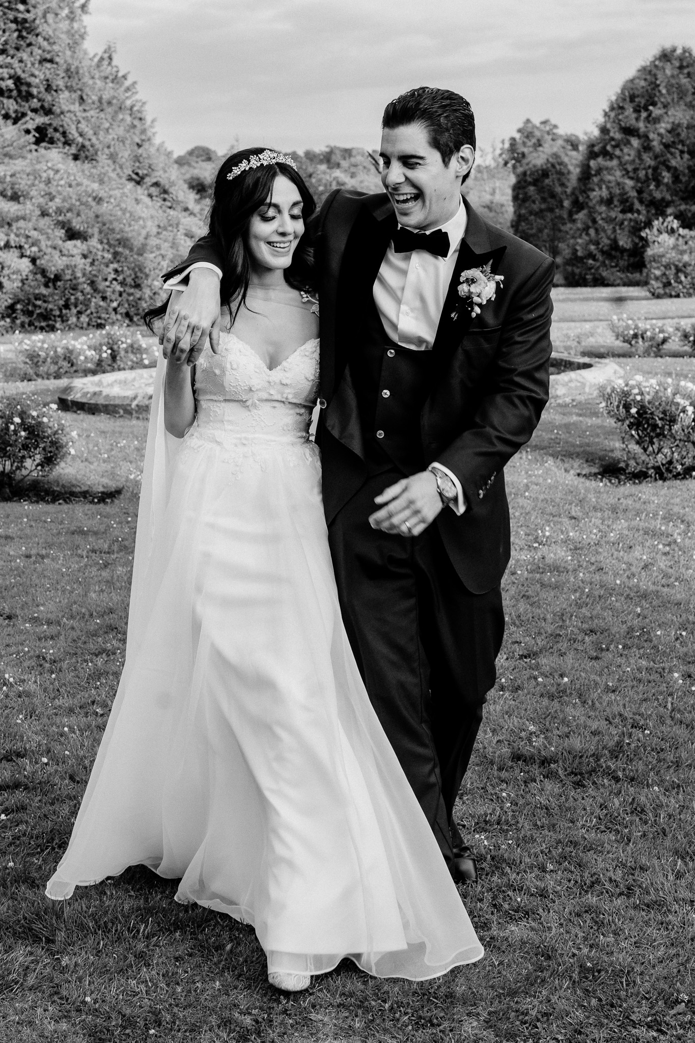 Black and white wedding portrait of bride and groom in the Markree Castle gardens