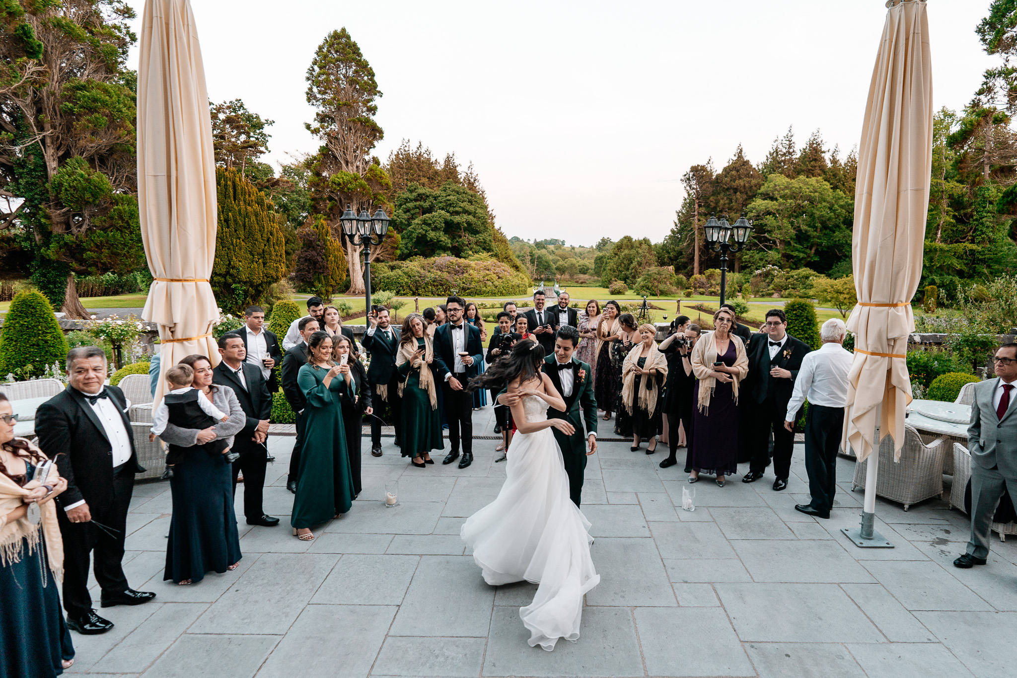 Bride dancing with her father outdoors during a Markree Castle wedding
