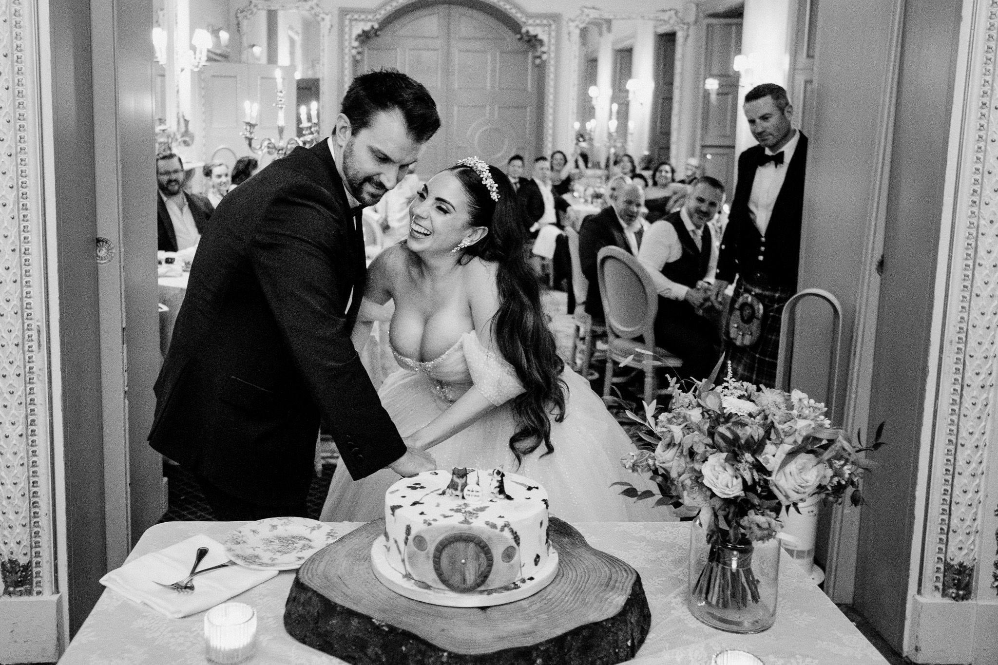 Bride and groom cutting their wedding cake at Markree Castle
