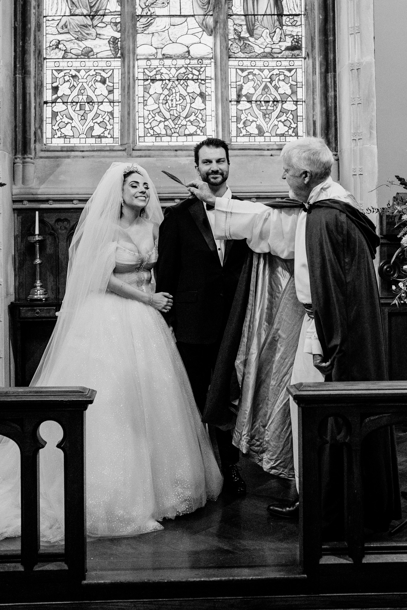 Bride and groom exchanging vows during their chapel wedding at Markree Castle