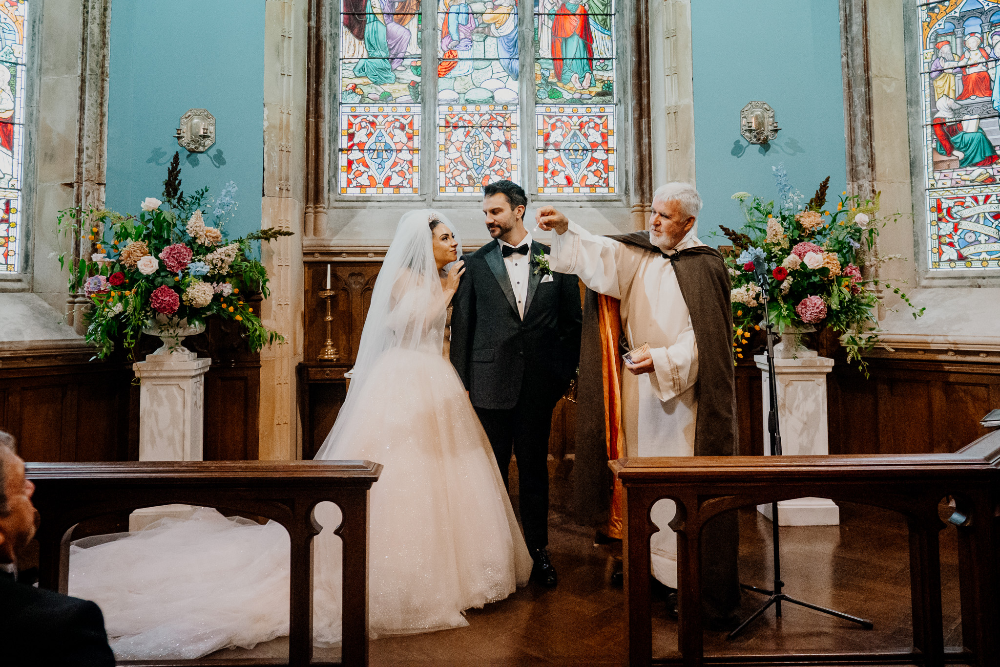 Bride and groom at the altar during their wedding ceremony in the Markree Castle chapel