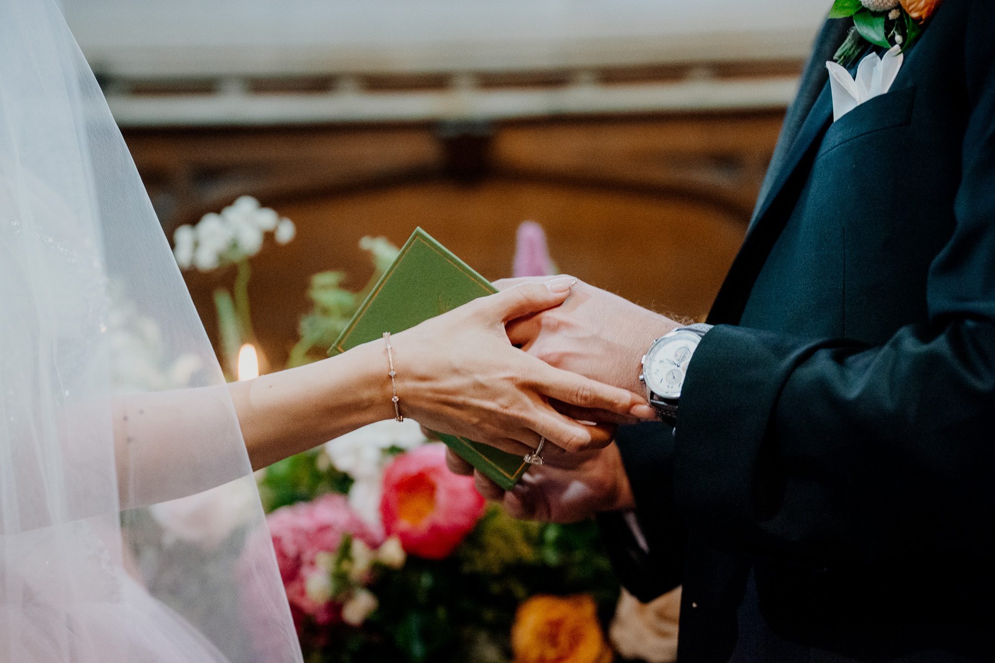 Wedding ring exchange during a ceremony in the chapel at Markree Castle