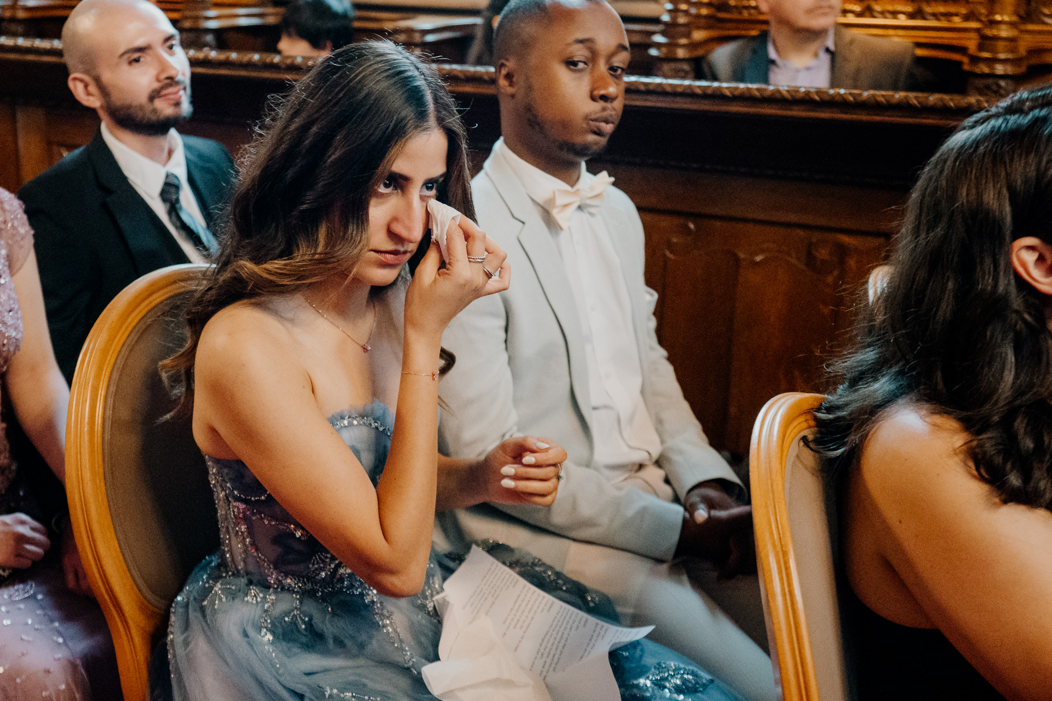 Emotional guest reaction during a wedding ceremony in the chapel at Markree Castle