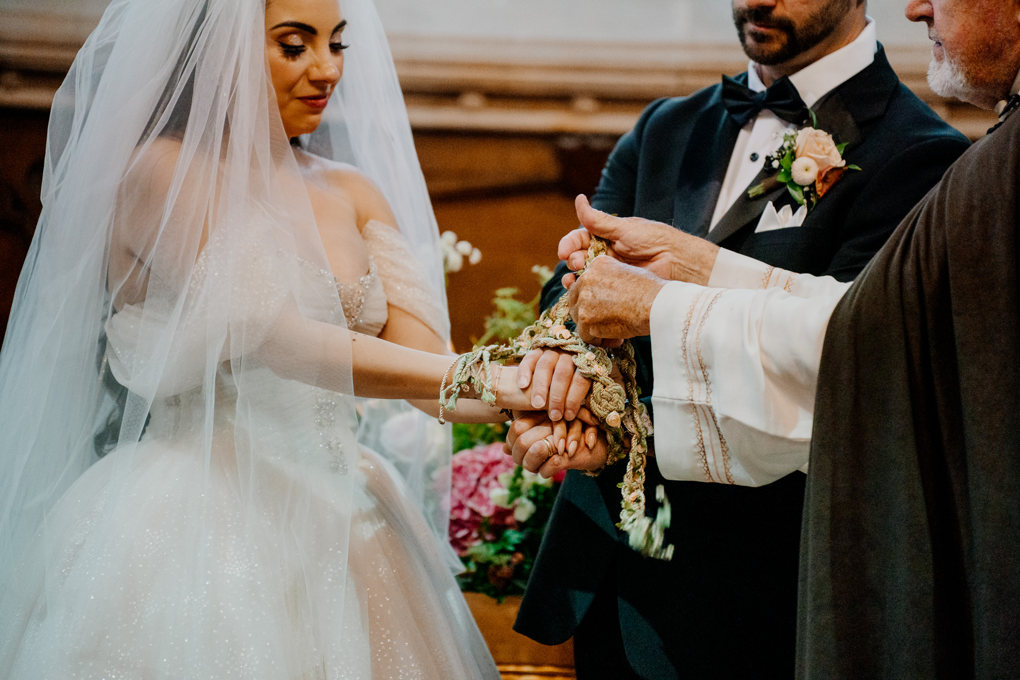 Bride holding her wedding bouquet during the chapel ceremony at Markree Castle