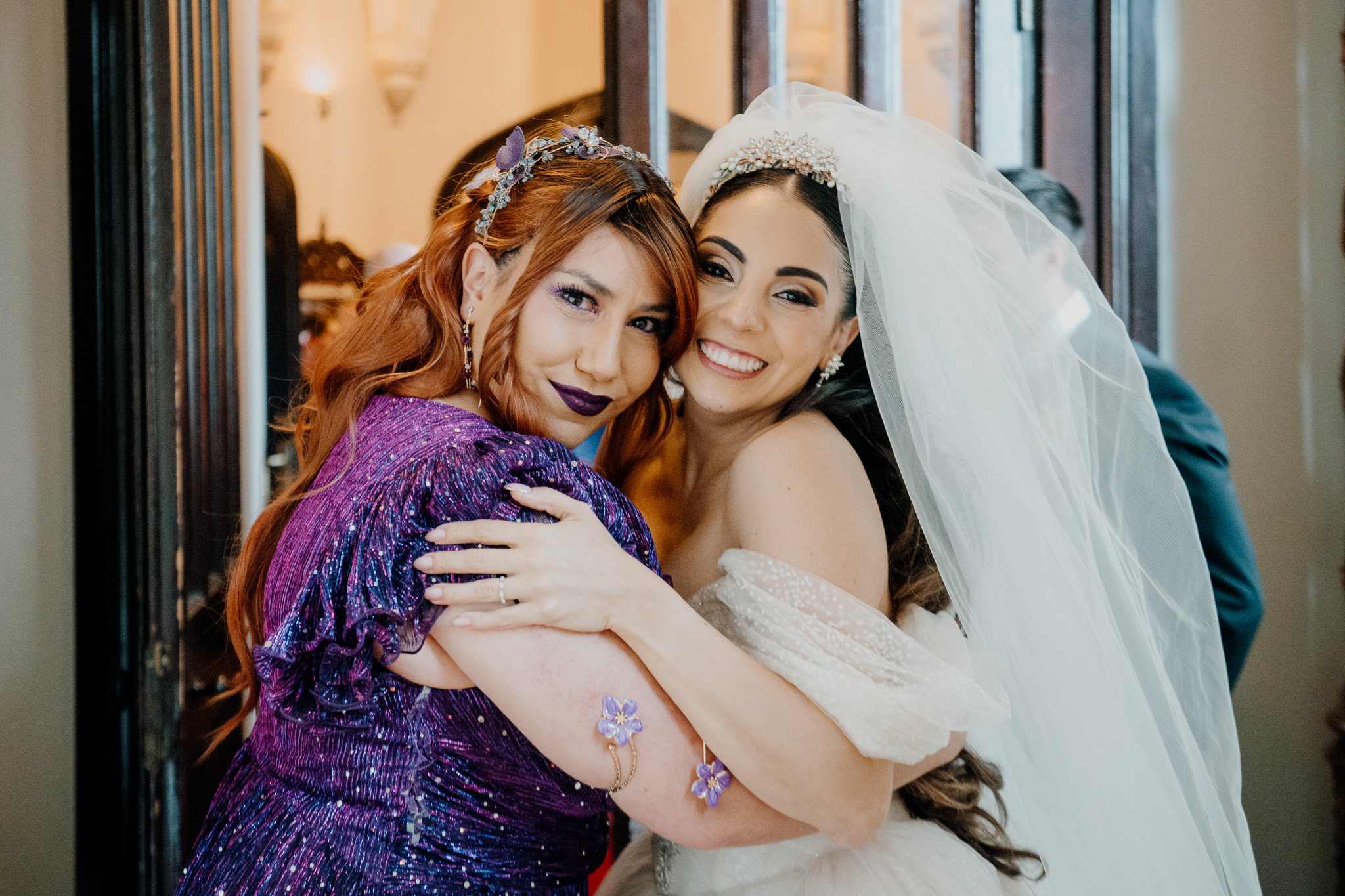Emotional moment between wedding guests during the Markree Castle chapel ceremony