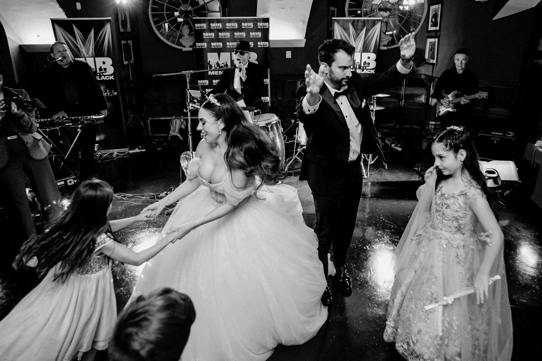Bride and groom dancing with guests on the dance floor at Markree Castle