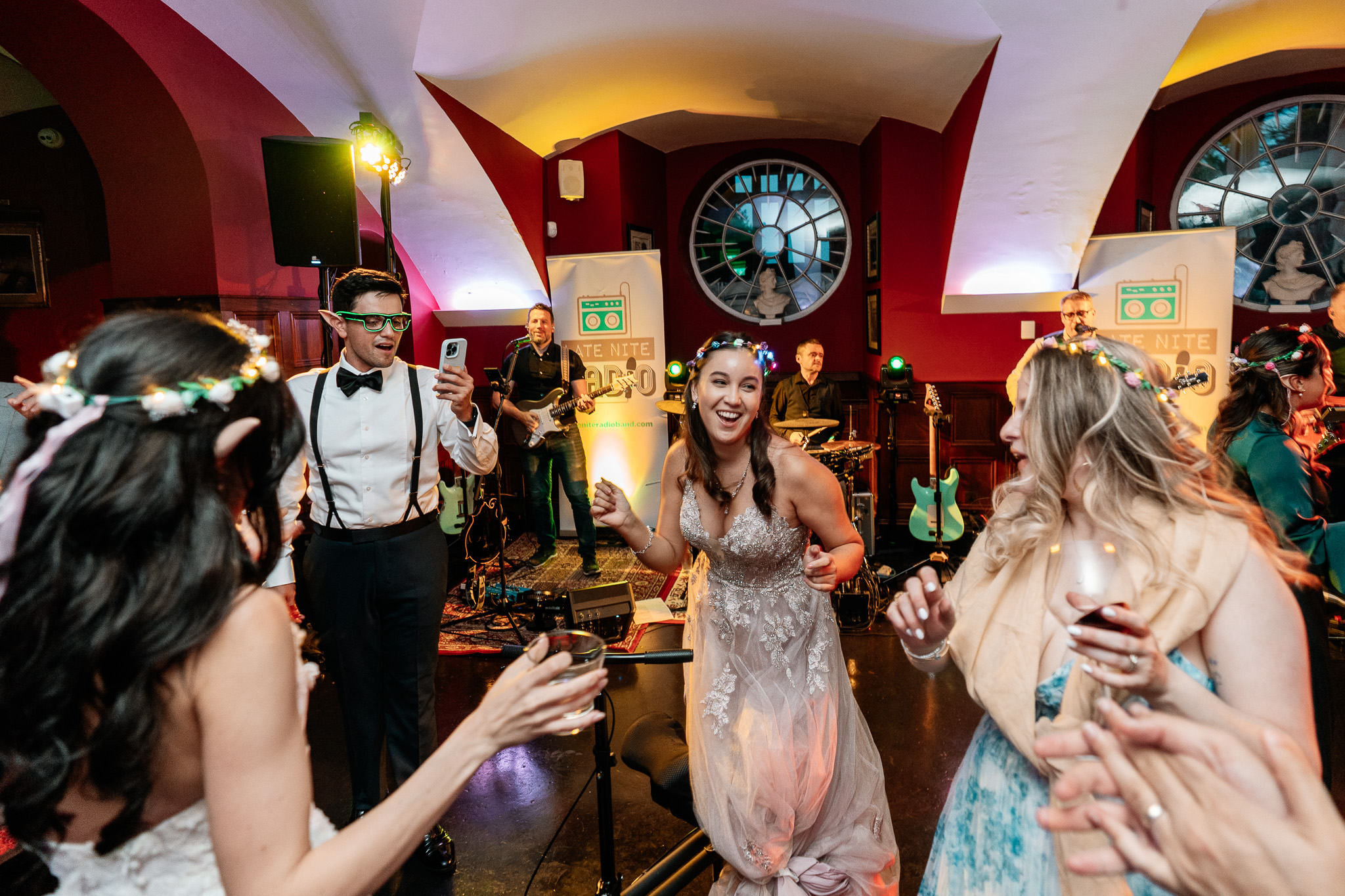 Wedding guests wearing elf ears on the dance floor at Markree Castle