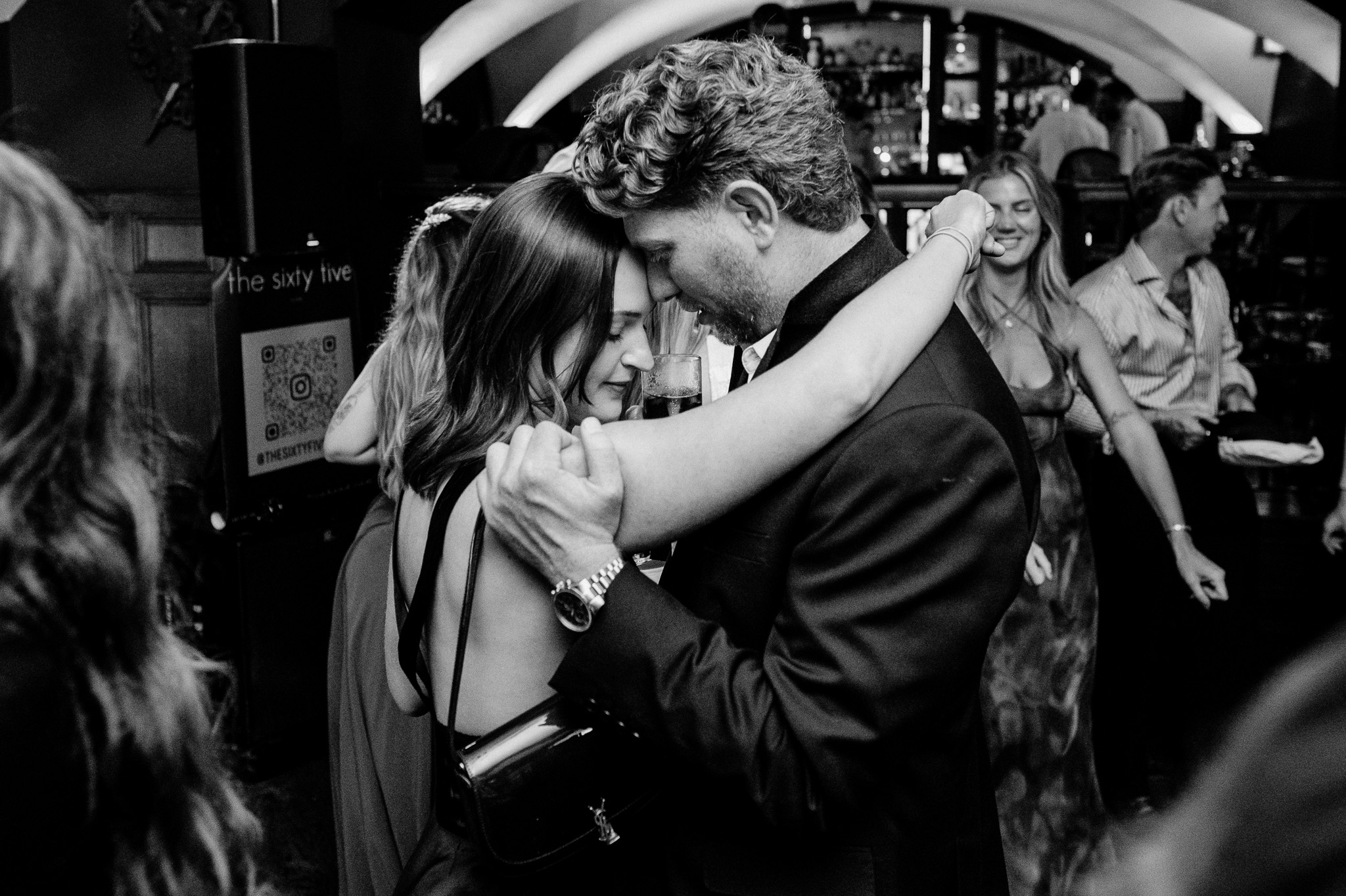 Wedding guests sharing an emotional moment on the dance floor at Markree Castle