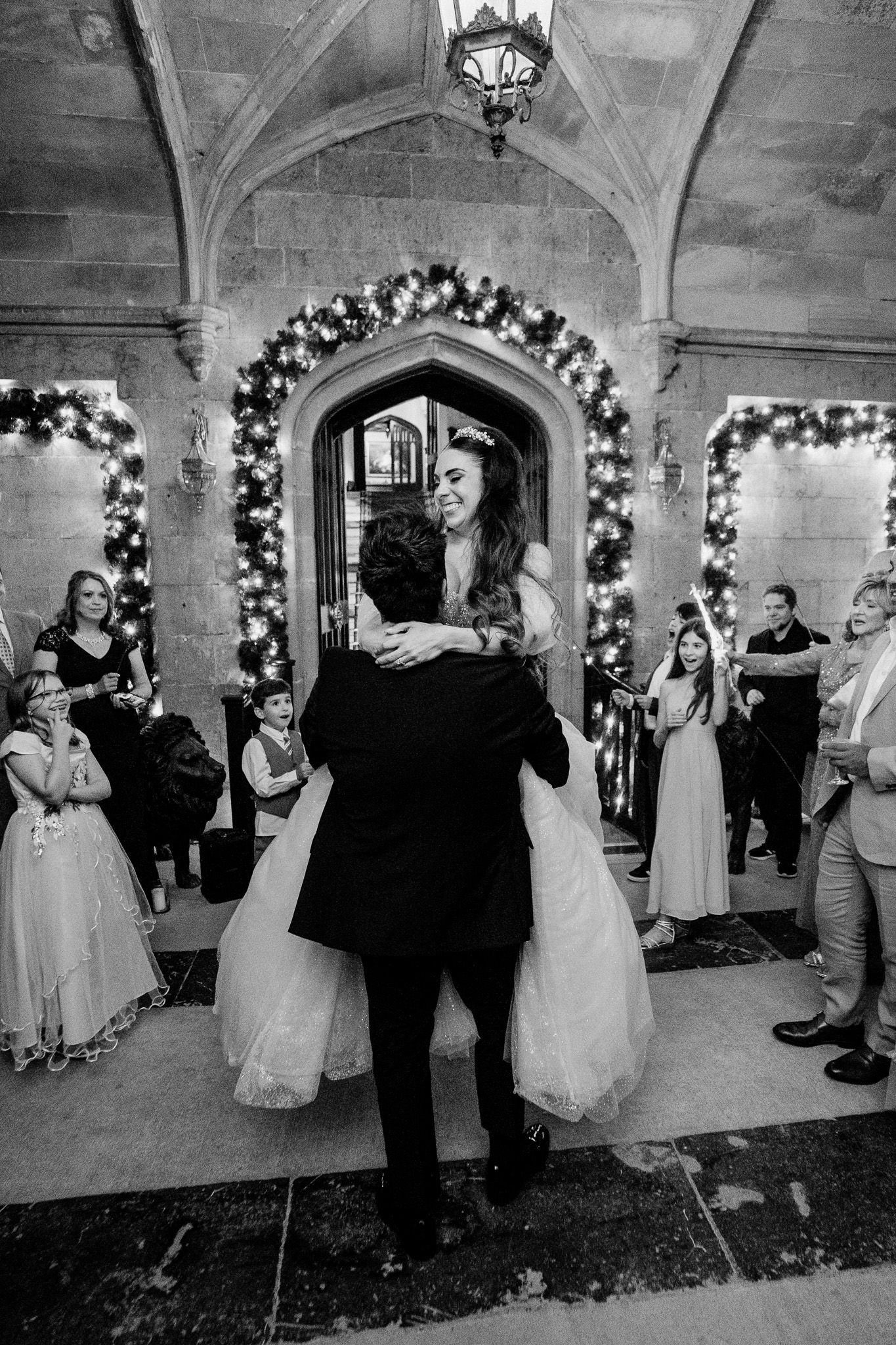 Wedding first dance beneath the entrance archway at Markree Castle