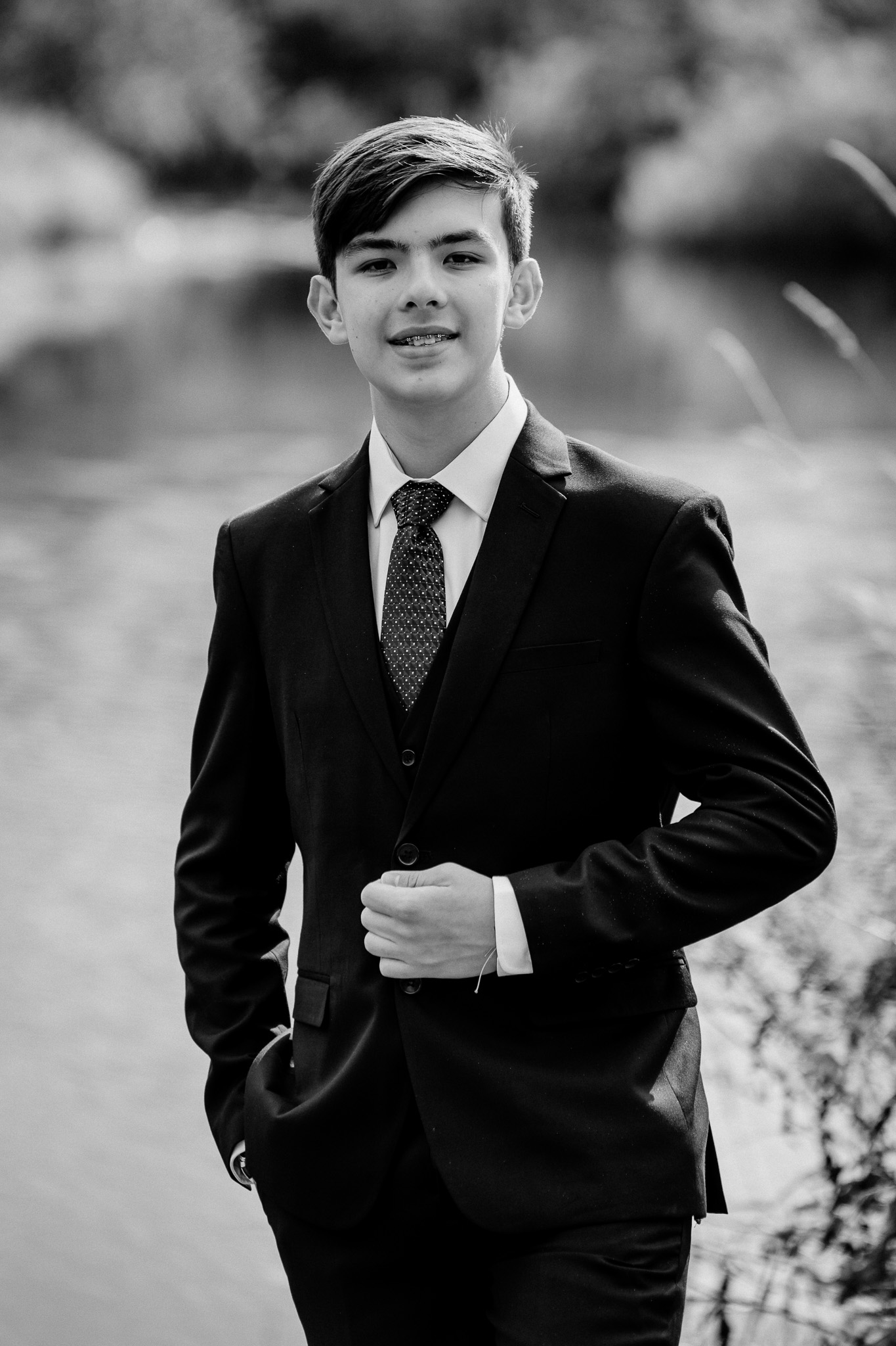 Black and white portrait of a wedding guest with Markree Castle in the background