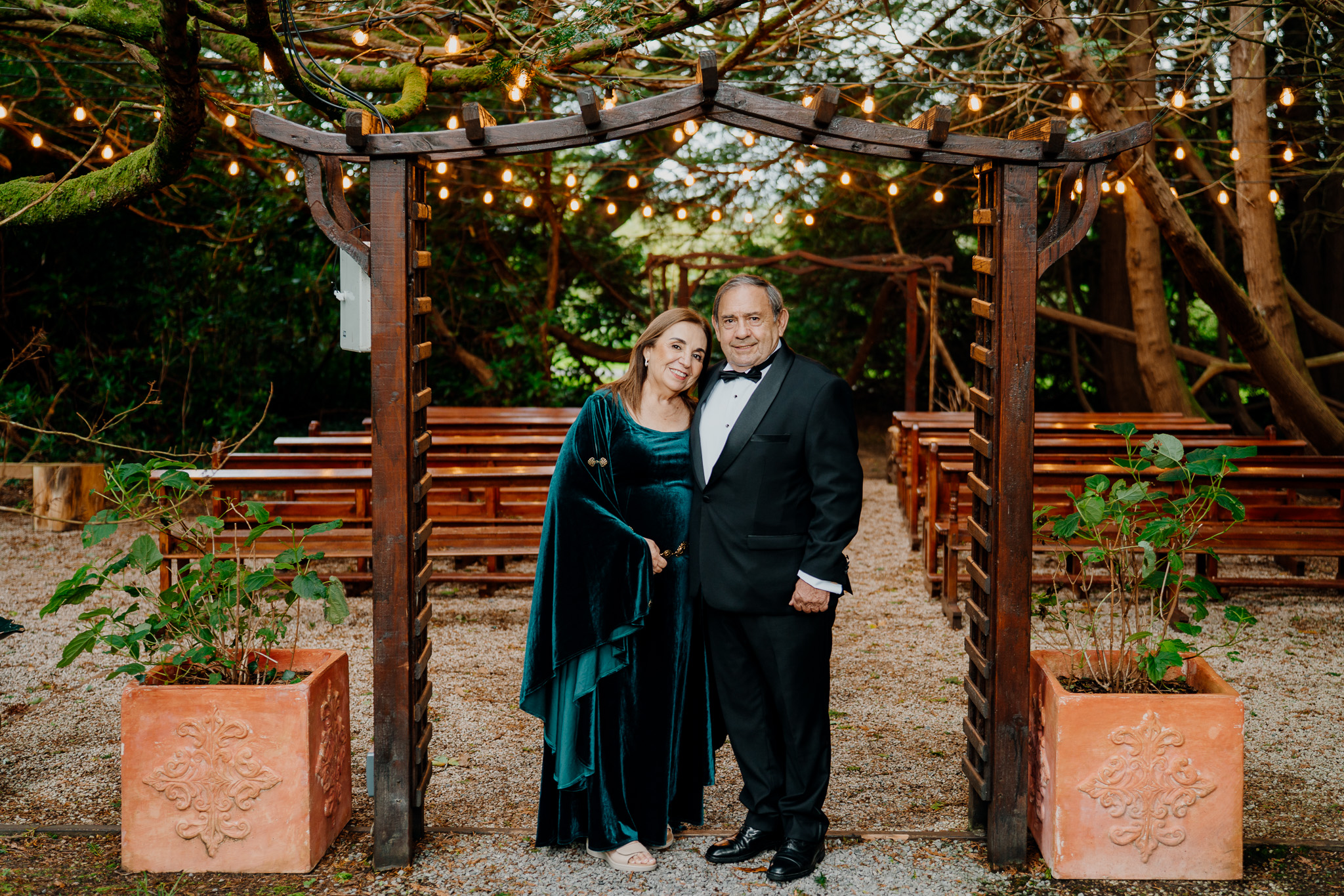 Wedding guest in the landscaped forest ceremony area at Markree Castle