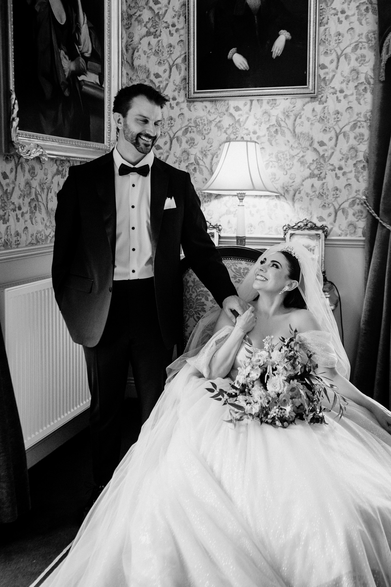 Bride and groom posing for an indoor wedding portrait at Markree Castle