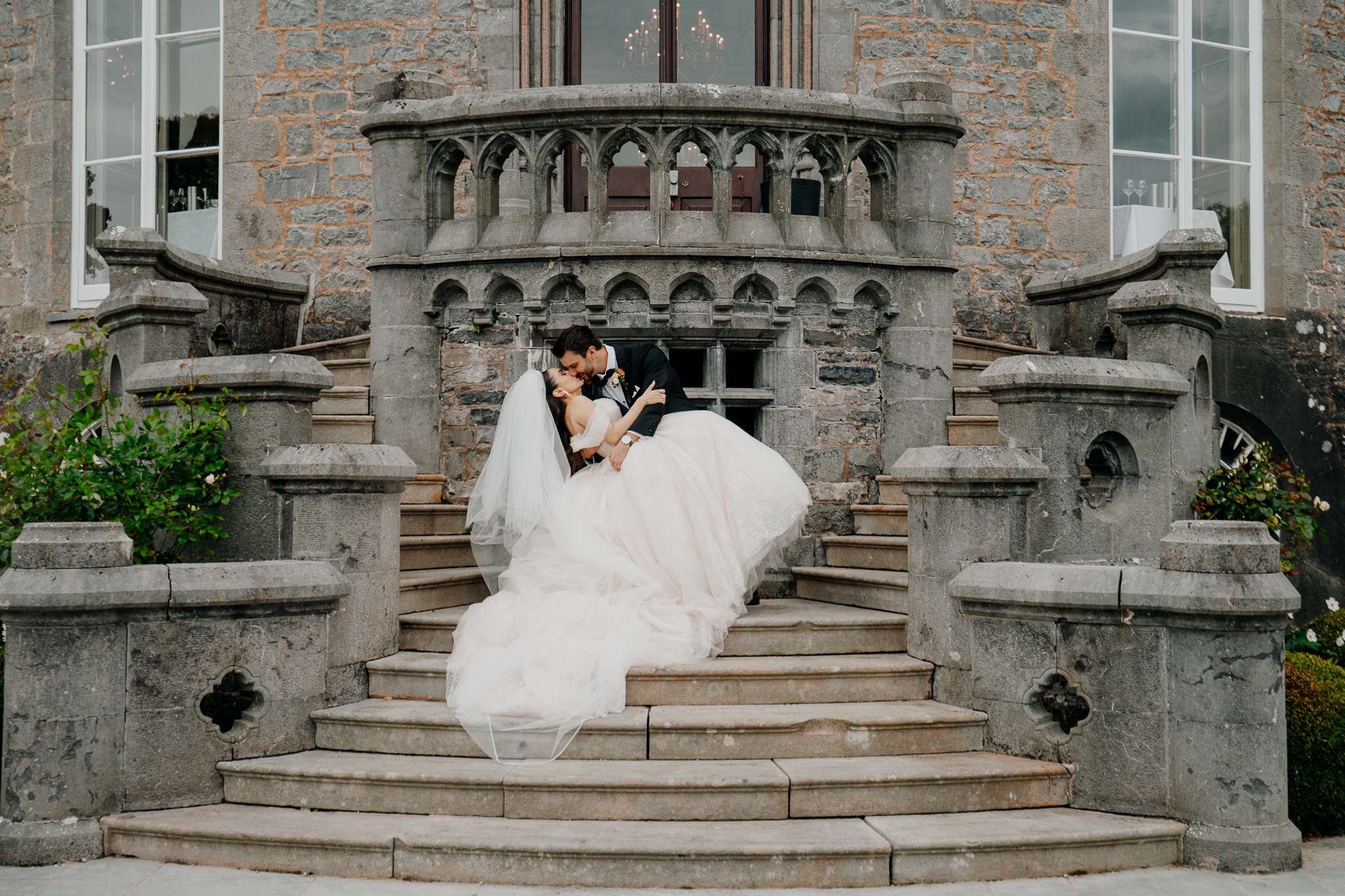 Bride and groom wedding portrait on the garden terrace steps at Markree Castle