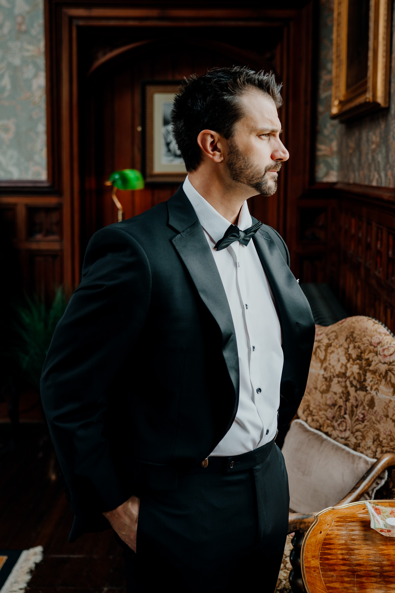 Groom getting ready in the Billiard Room at Markree Castle