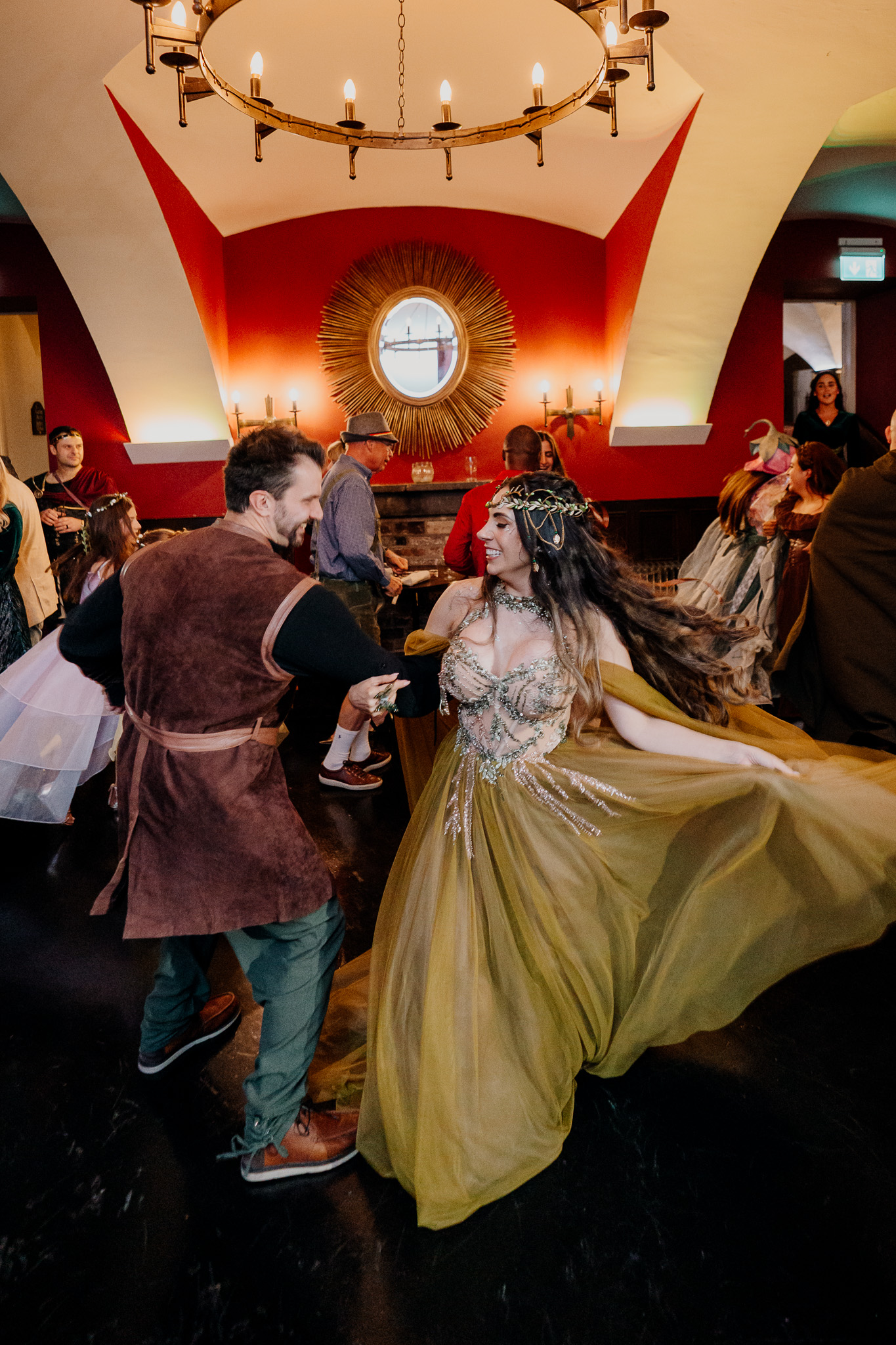 Guests having fun at a fantasy themed wedding rehearsal dinner at Markree Castle