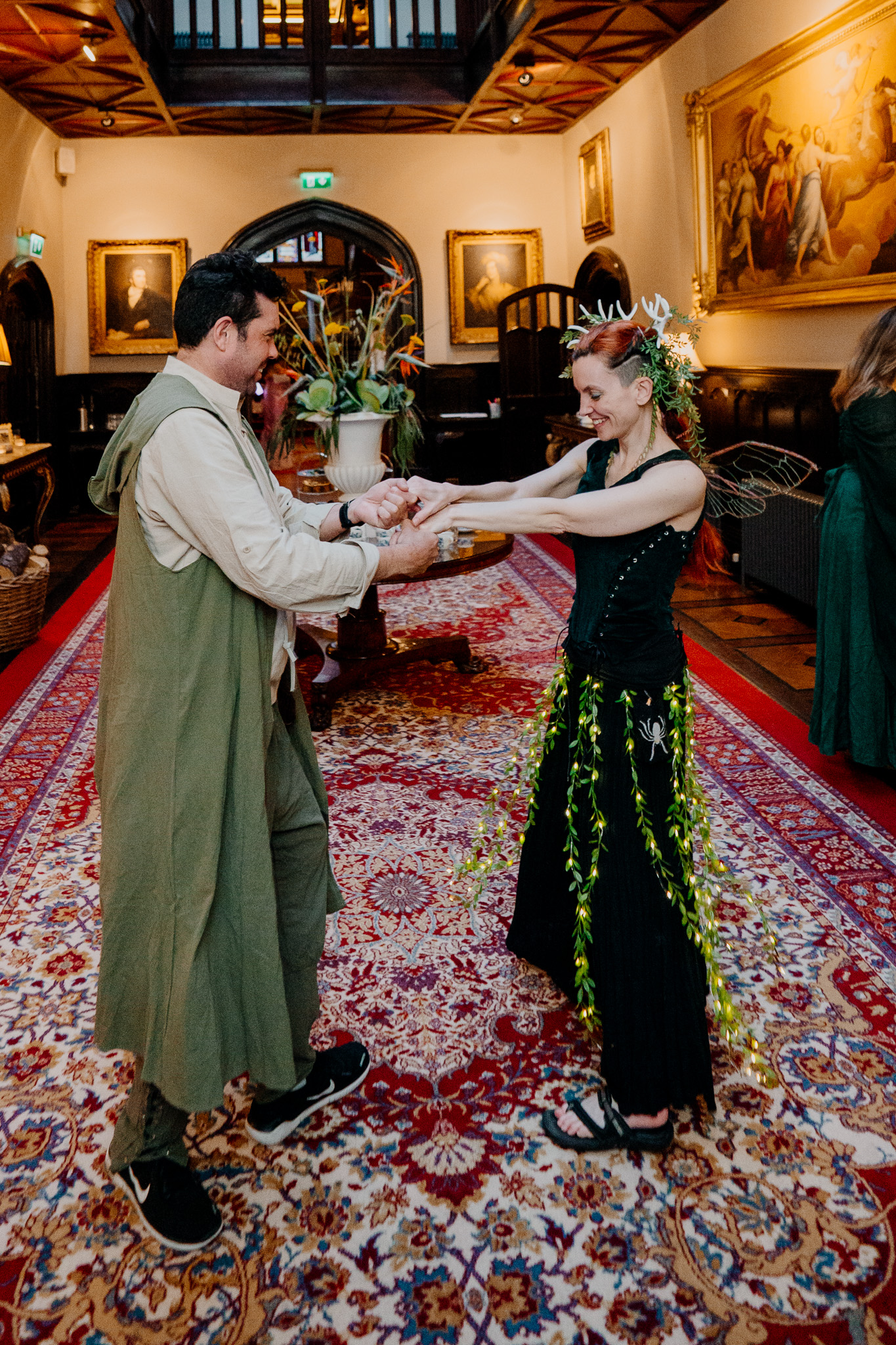 Wedding guests celebrating together at a Markree Castle rehearsal dinner