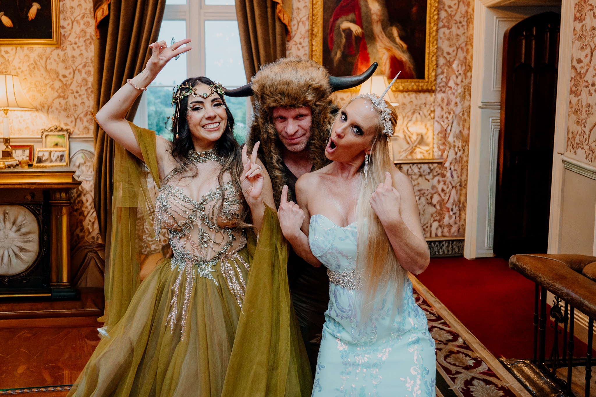 Guests in costumes at a fantasy wedding rehearsal dinner at Markree Castle