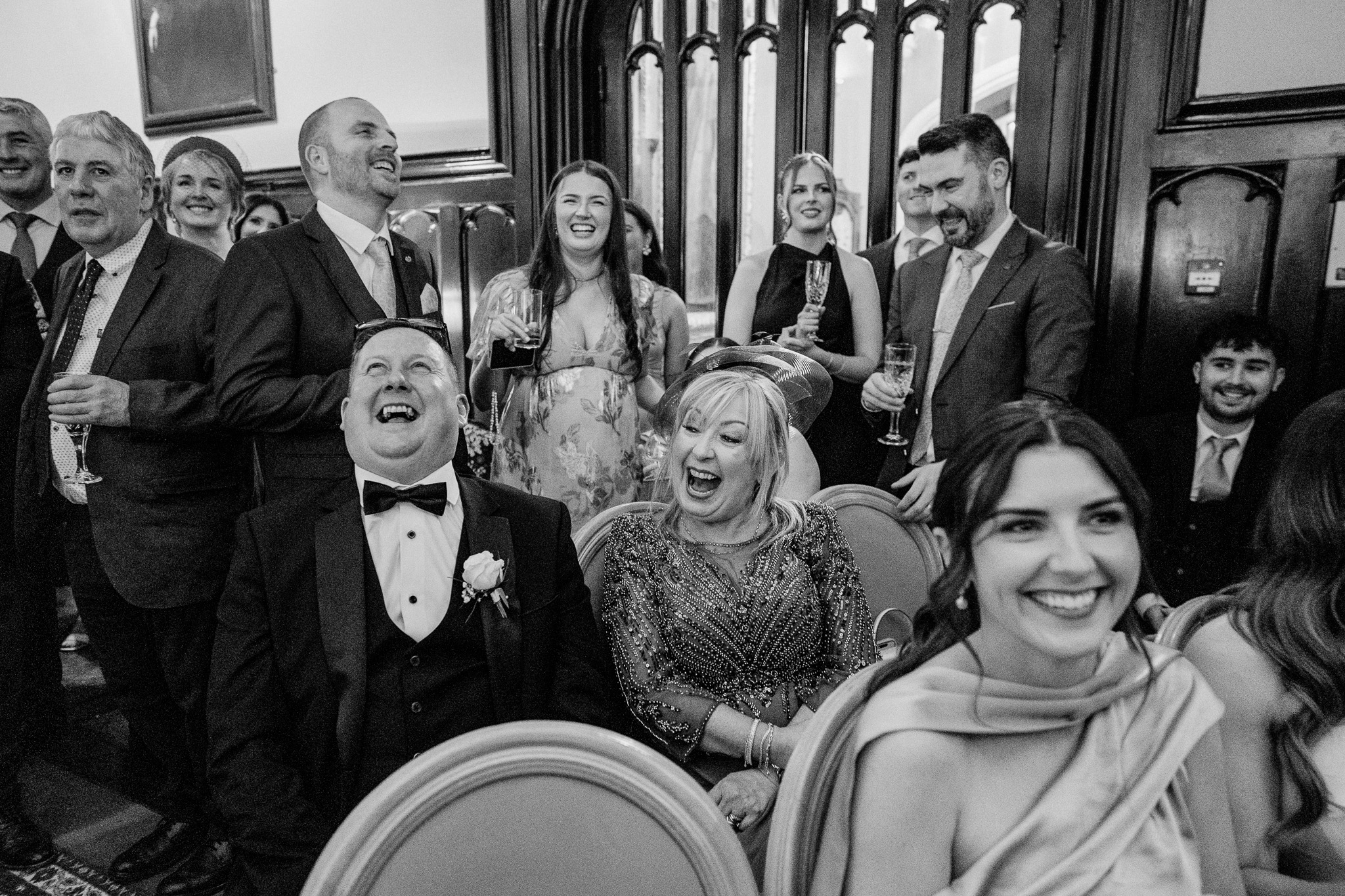 Wedding guests laughing during the speeches at Markree Castle