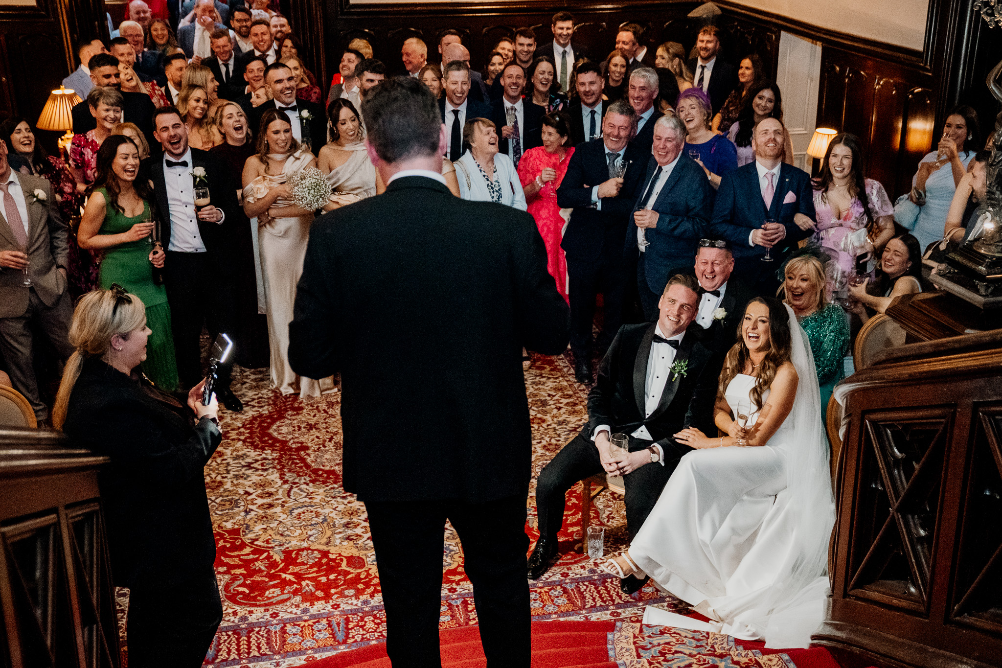 Wedding guests reacting during the speeches at Markree Castle