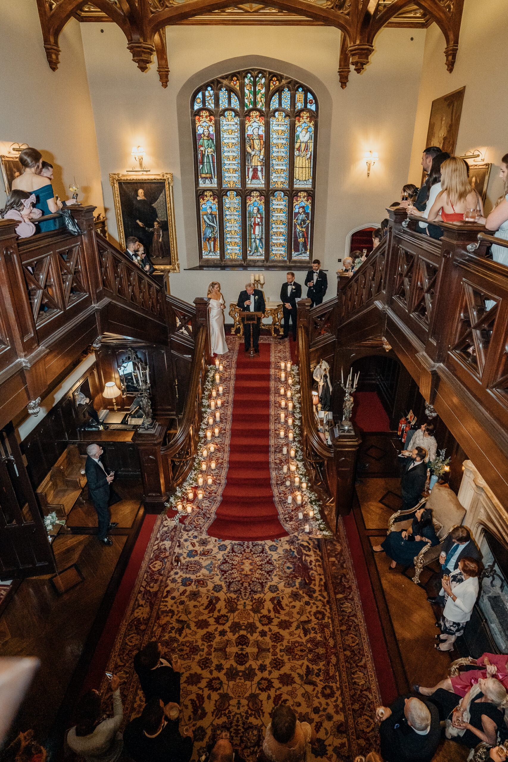 Wedding guests watching the speeches inside Markree Castle