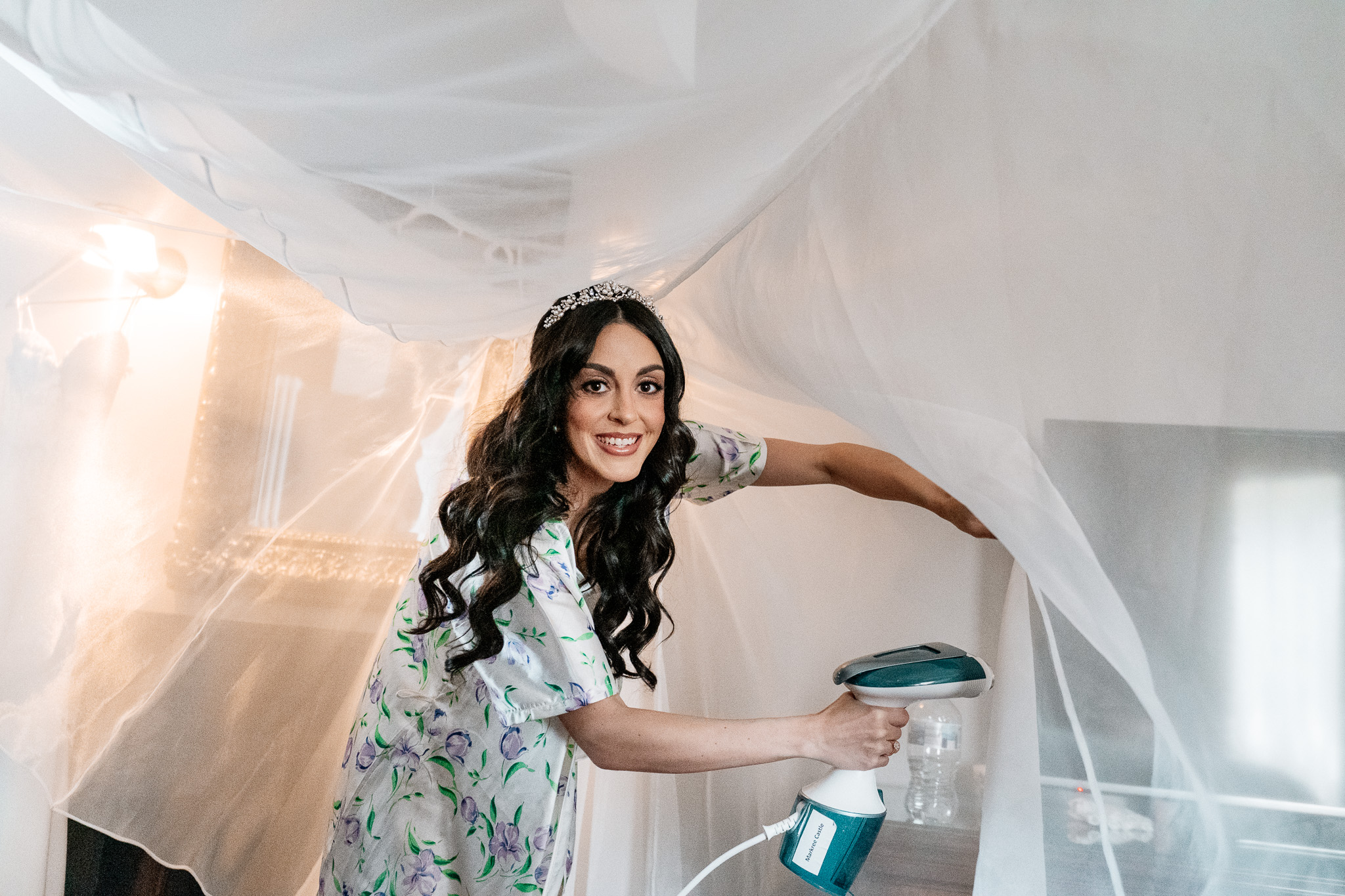 Bride preparing her wedding dress in the Bridal Suite at Markree Castle