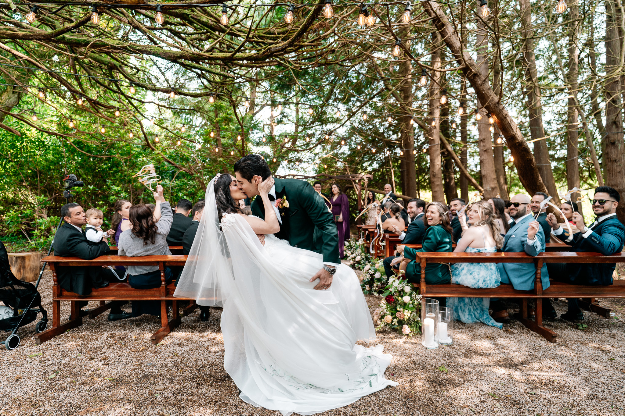 Shannon and Michael kiss after their woodland wedding ceremony at Markree Castle in Sligo