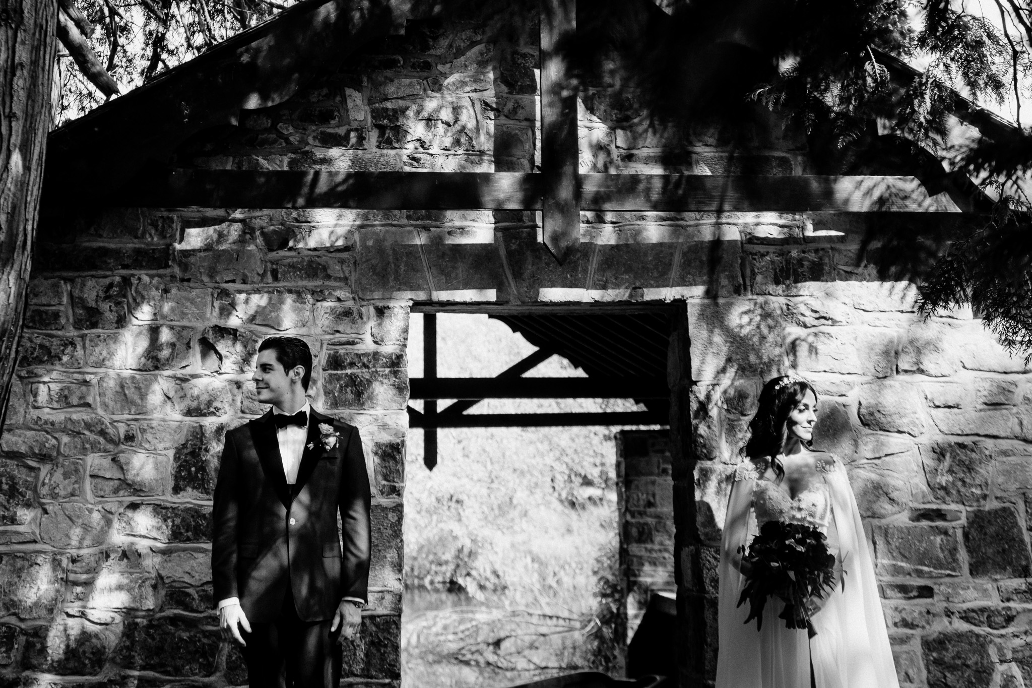 Black and white wedding portrait of bride and groom at the Markree Castle Boathouse