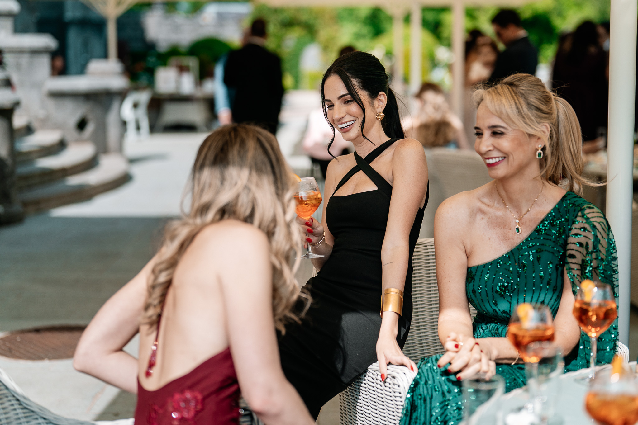 Bride enjoying the outdoor wedding reception with guests at Markree Castle