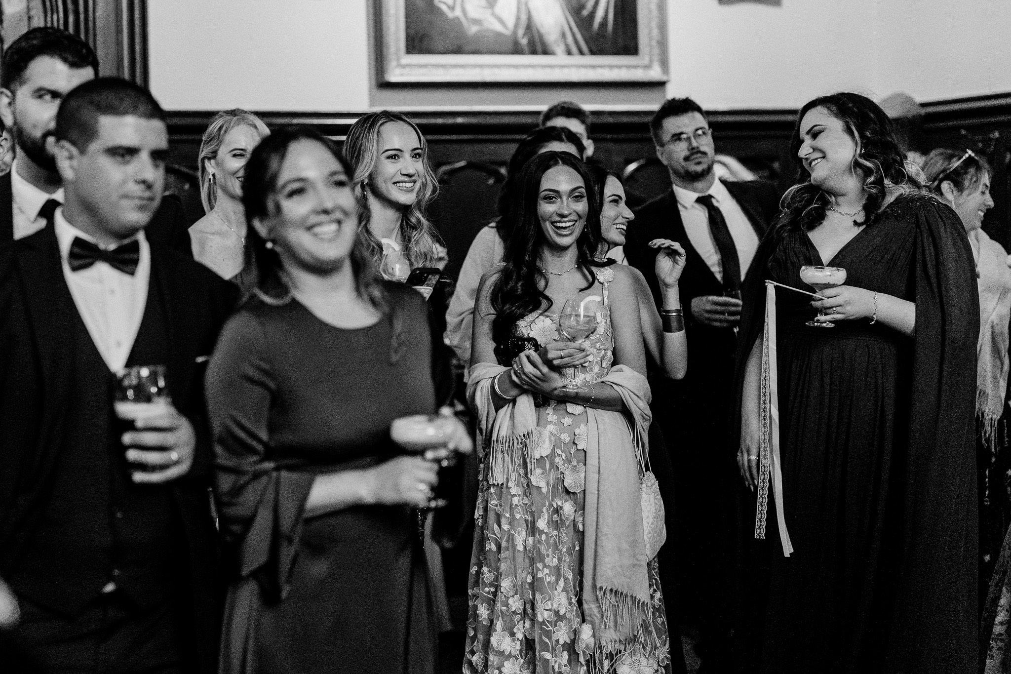 Wedding guests laughing during the speeches inside Markree Castle