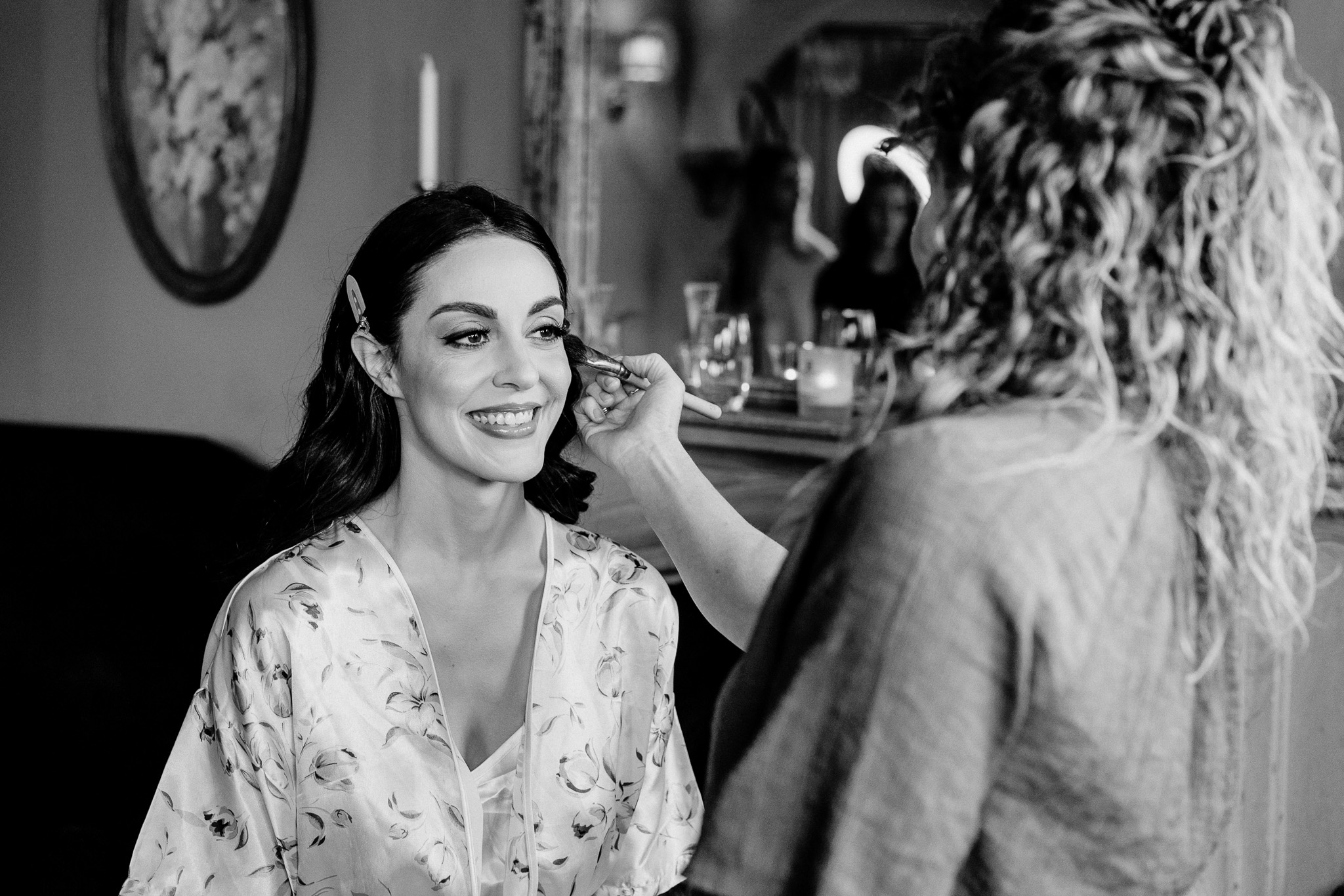 Bride having her makeup finished in the Butler’s Kitchen at Markree Castle