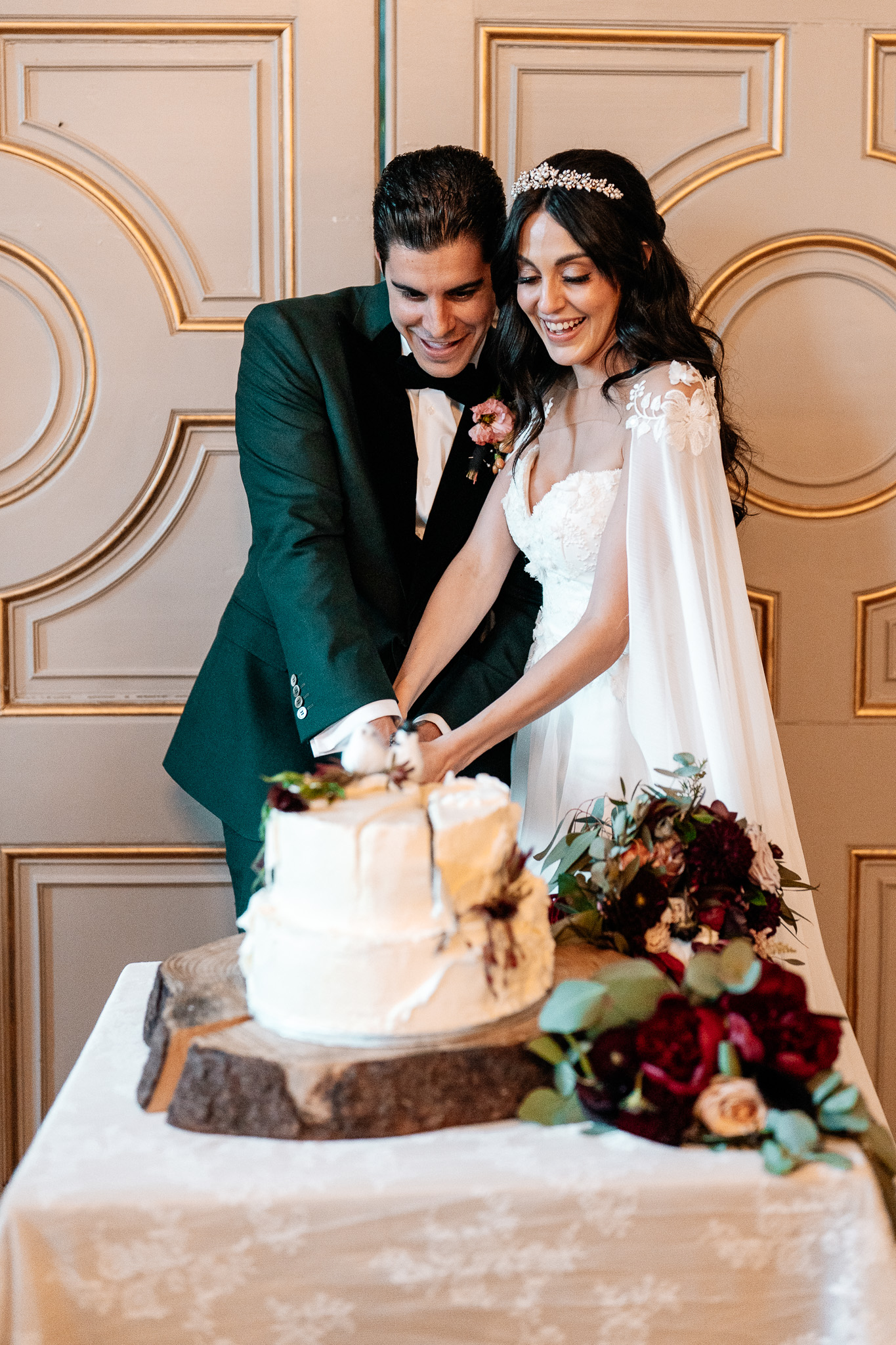 Bride and groom cutting their wedding cake at Markree Castle
