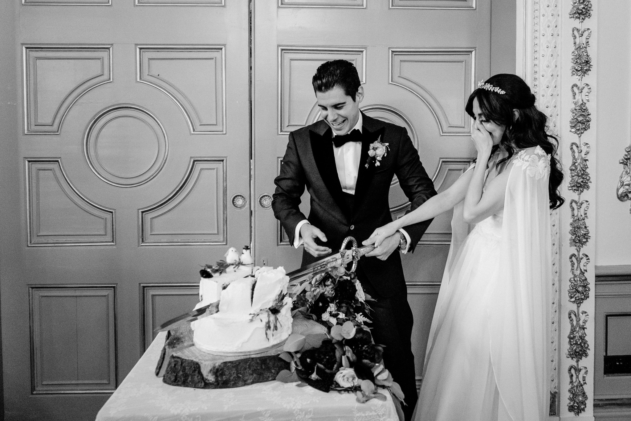 Candid moment during the wedding cake cutting at Markree Castle