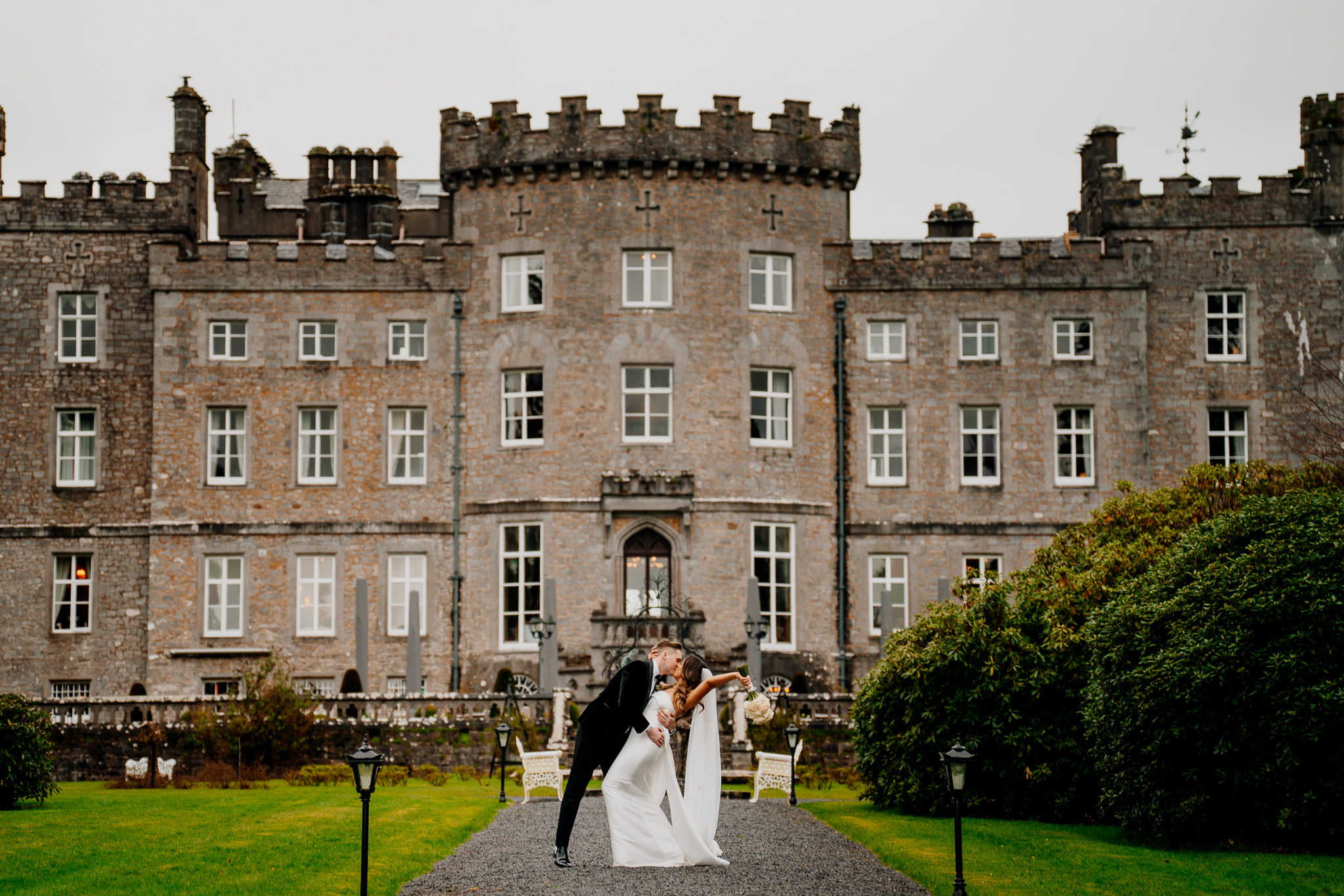 Wedding couple in front of Markree Castle and its gardens