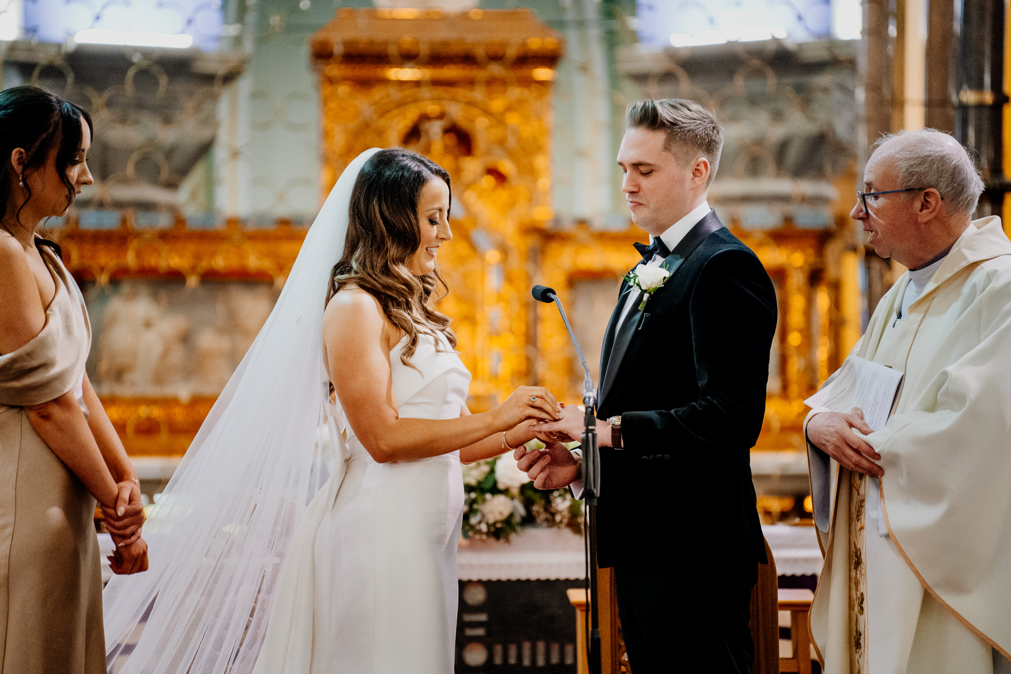 Bride and groom exchanging vows during their wedding ceremony in Sligo