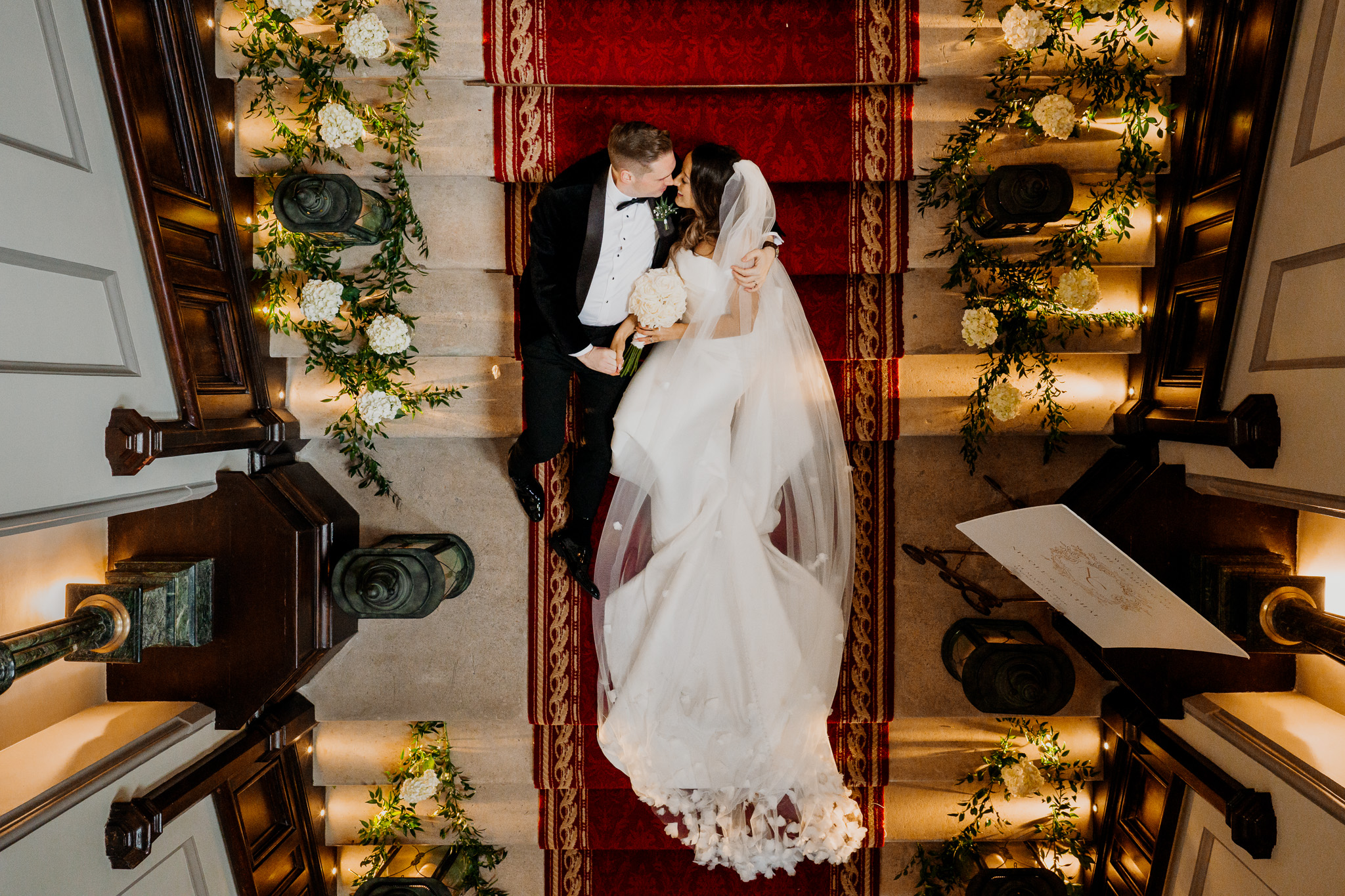 Bride and groom on the main entrance steps of Markree Castle