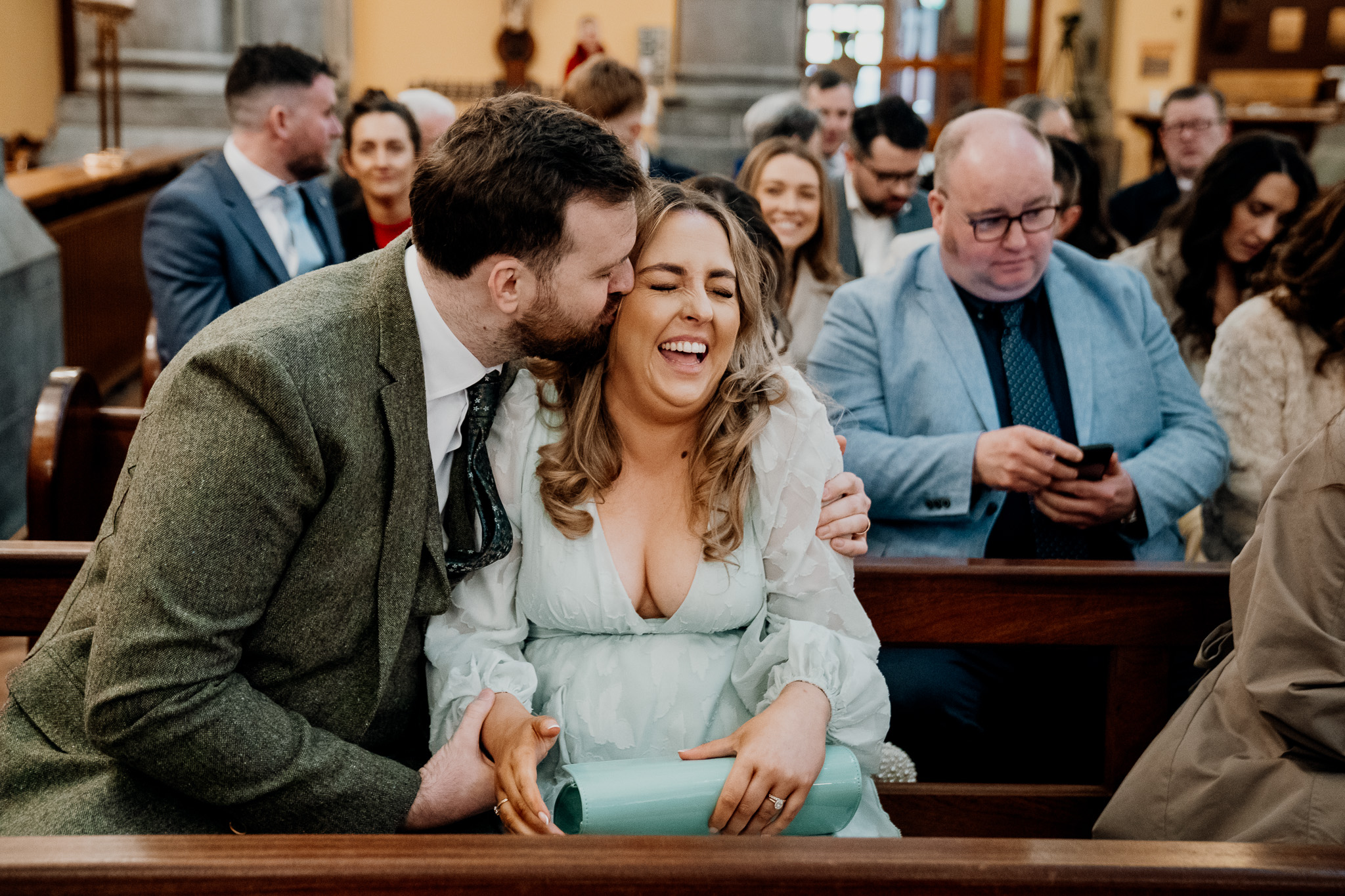 Bride laughing during her wedding ceremony at Sligo Cathedral