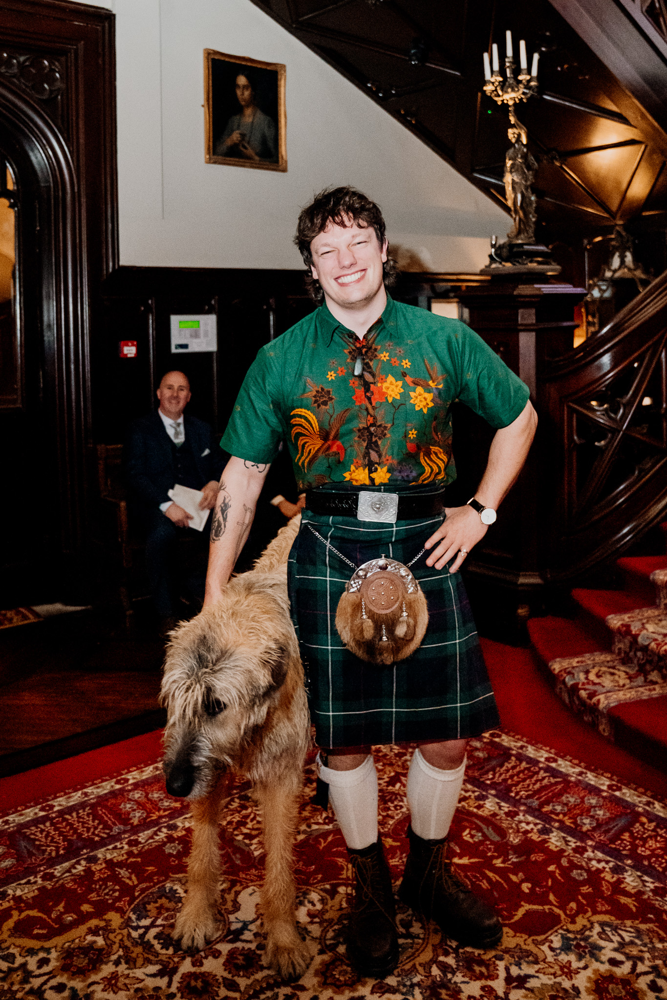 Wedding guest on the staircase during the speeches at Markree Castle