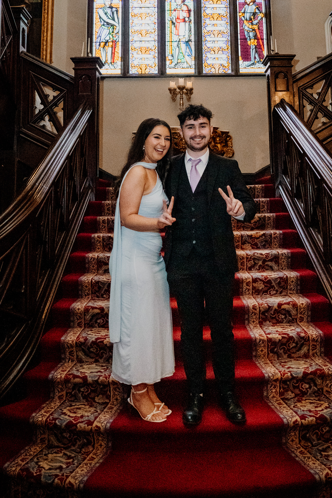 Wedding guests gathered on the staircase during speeches at Markree Castle