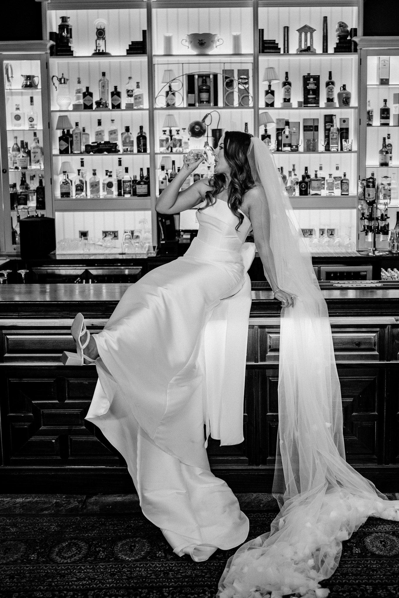 Bride and groom sharing a moment at the Gin Bar in Markree Castle