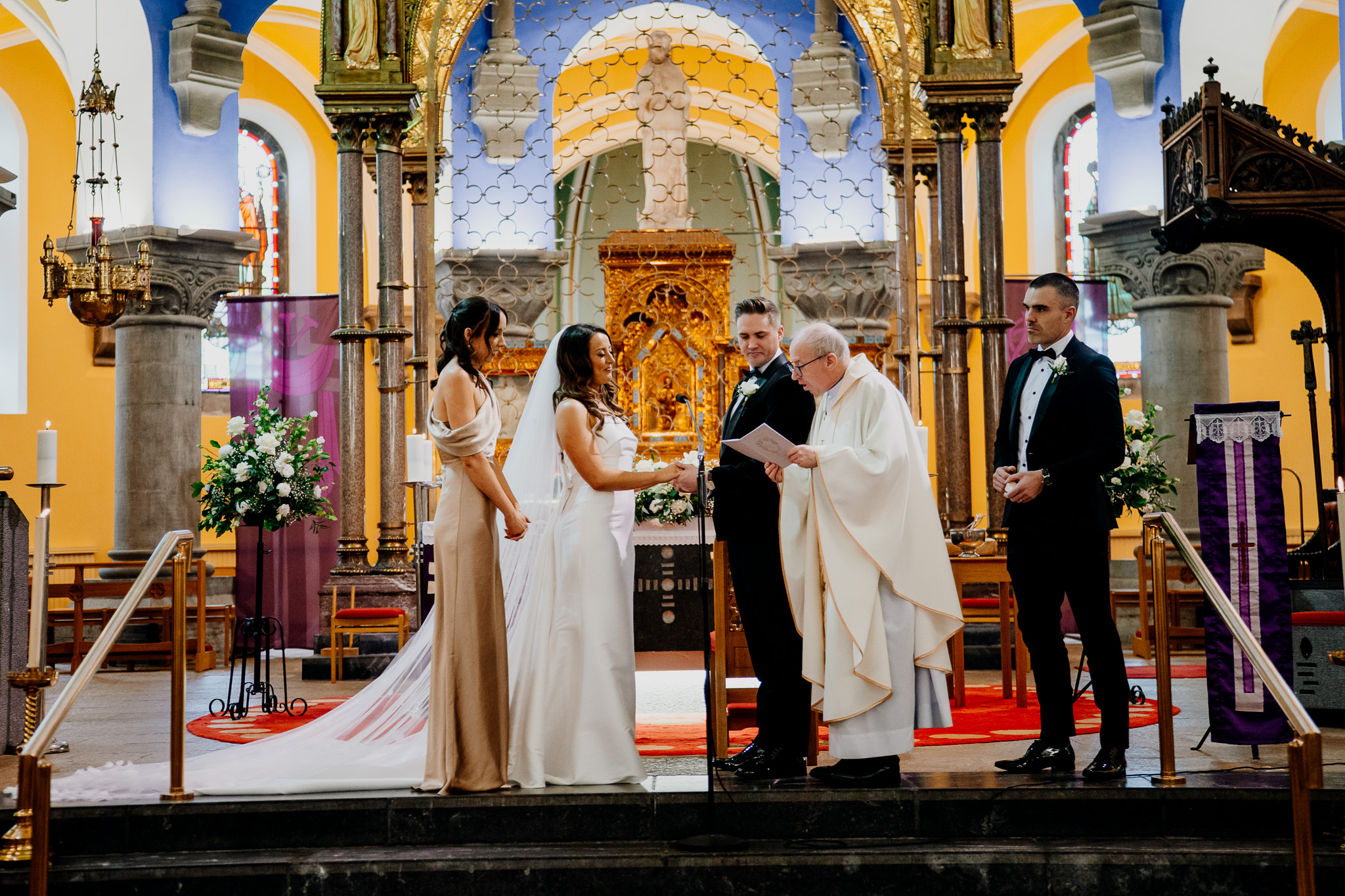Bride and groom at the altar during their Sligo Cathedral wedding