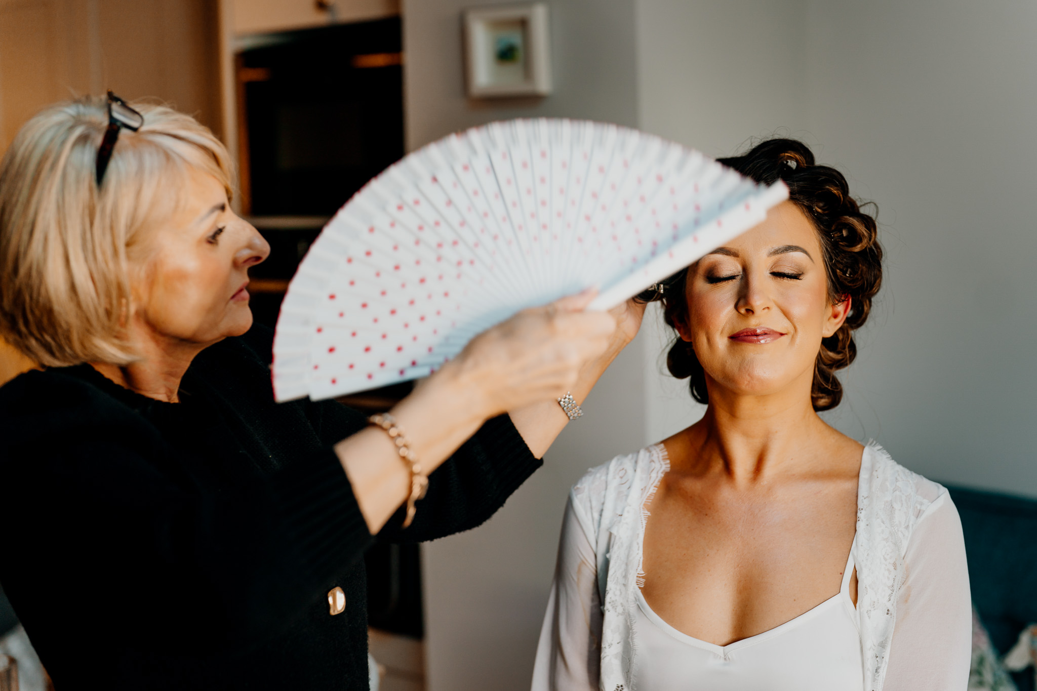 Bride having her makeup finished before her wedding ceremony in Sligo