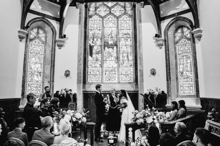 Black and white 35mm film wedding photograph in Markree Castle chapel