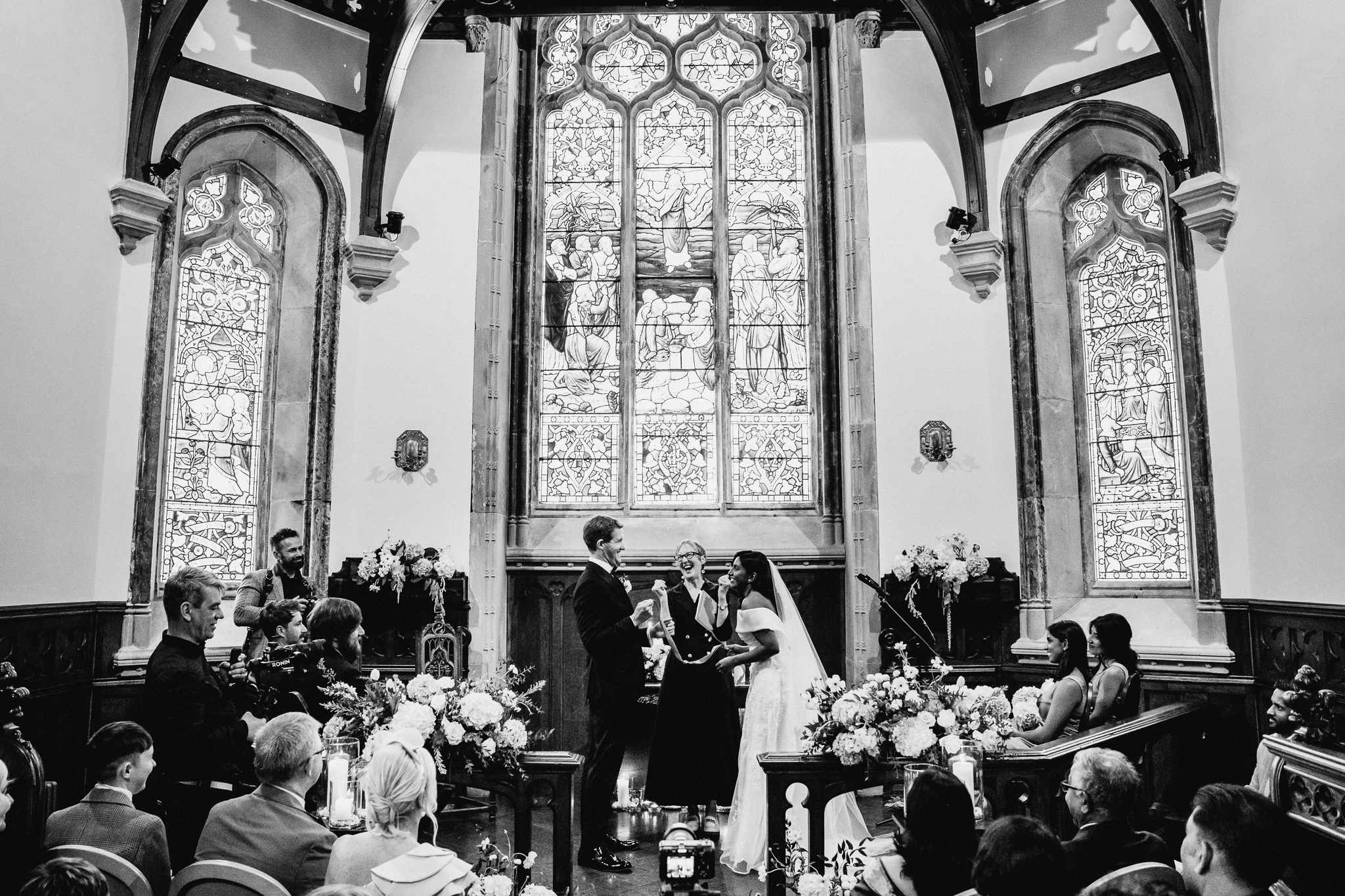 Black and white 35mm film wedding photograph in Markree Castle chapel