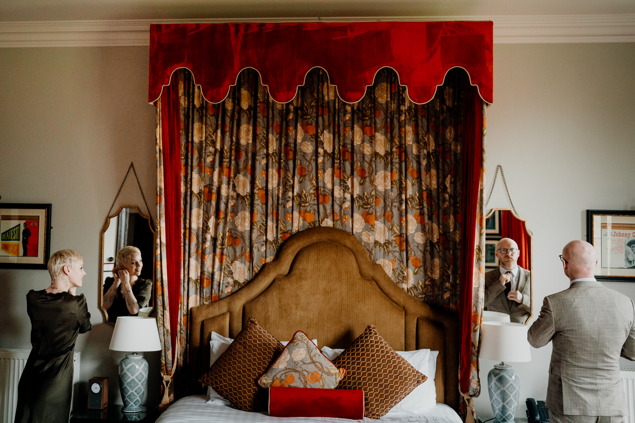 Ornate red curtains and traditional bedroom interior in the Johnny Cash Room at Markree Castle