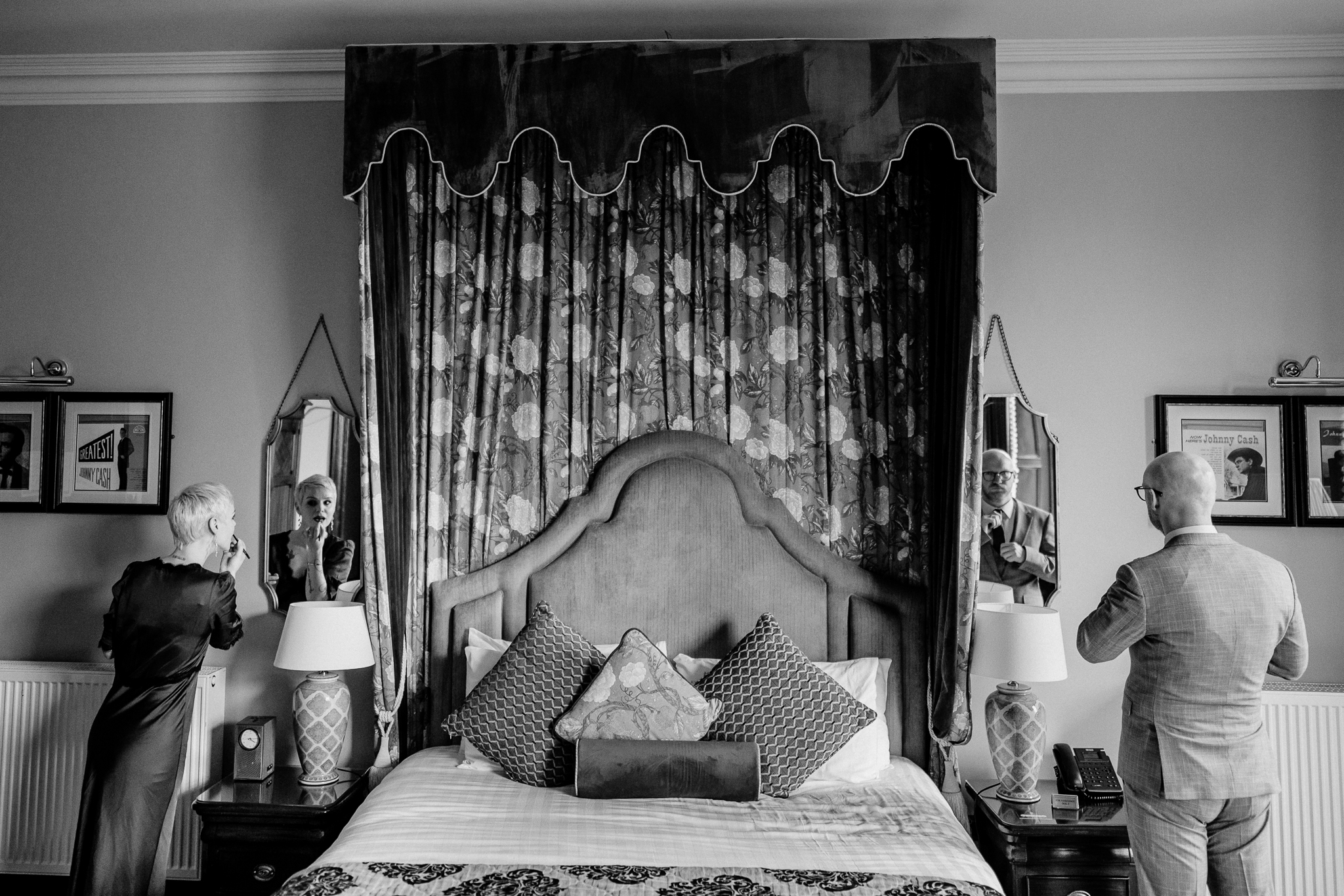 Black and white photograph of the ornate curtains and bedroom interior in the Johnny Cash Room at Markree Castle