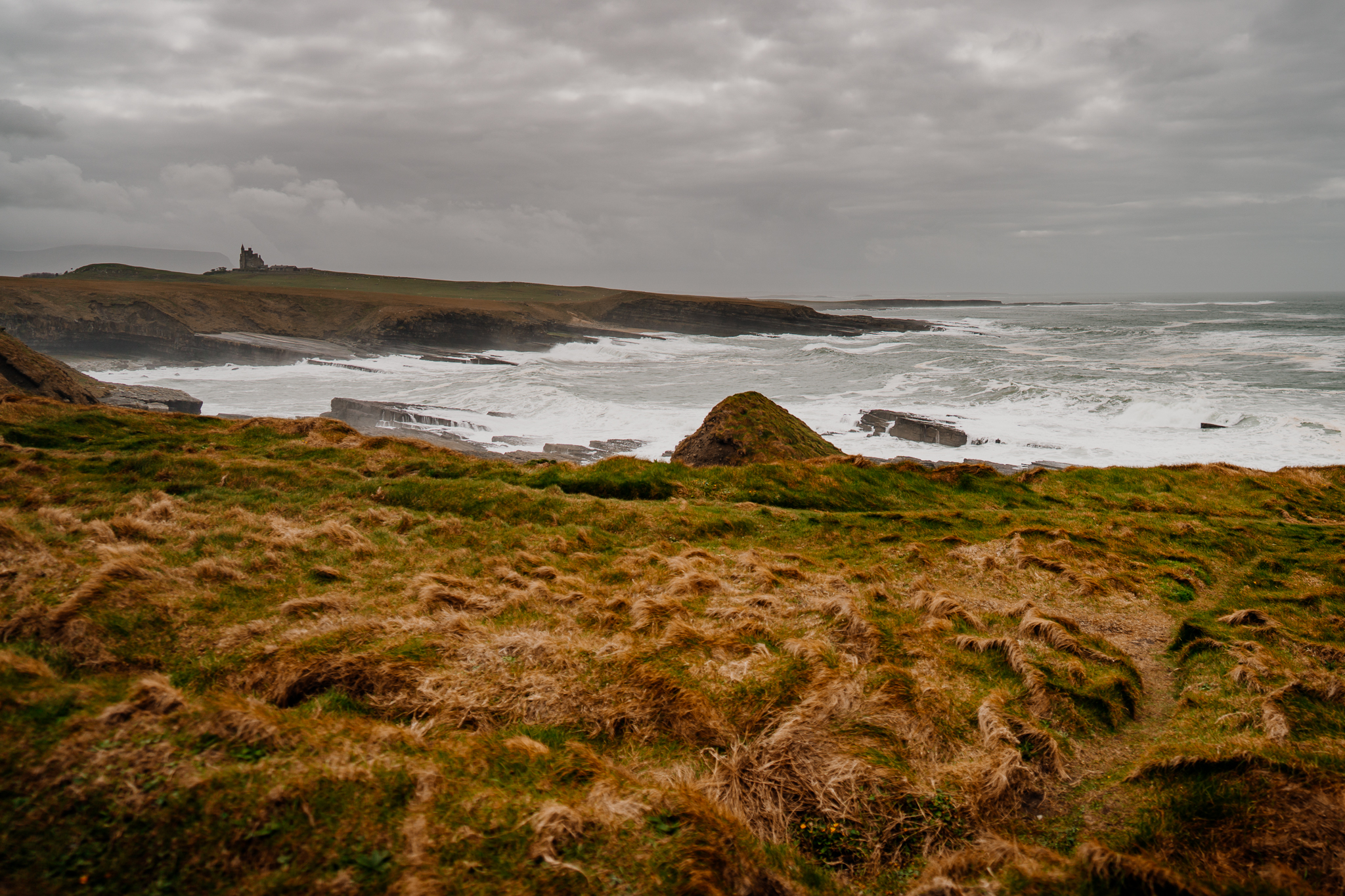 Rugged coastal cliffs and Atlantic waves at Mullaghmore Head in County Sligo Ireland