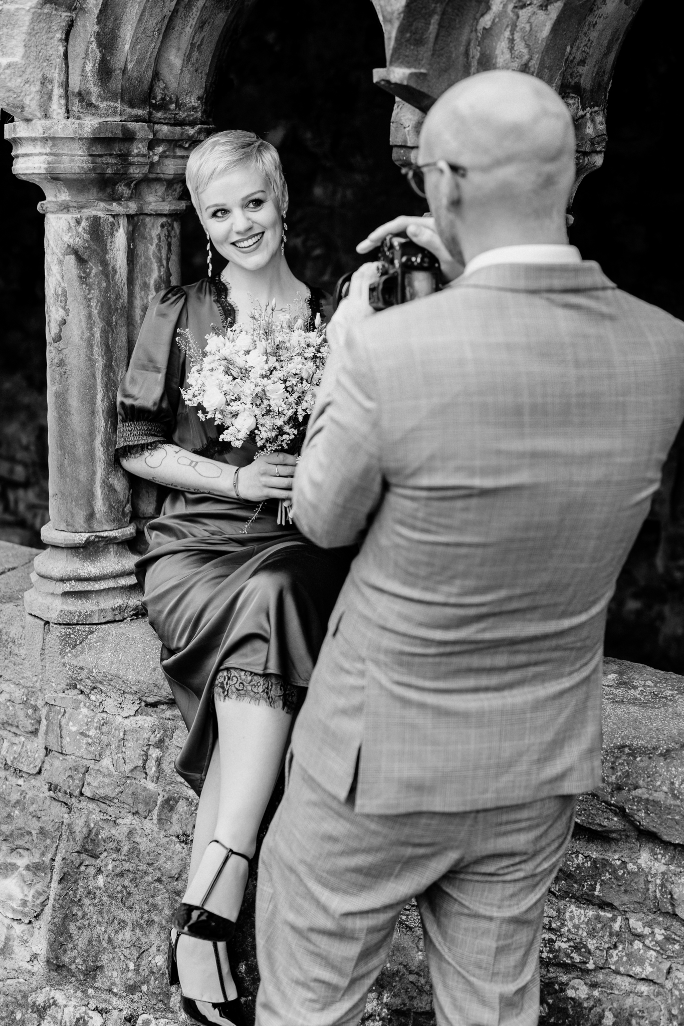 Black and white behind-the-scenes bridal portrait session at Sligo Abbey