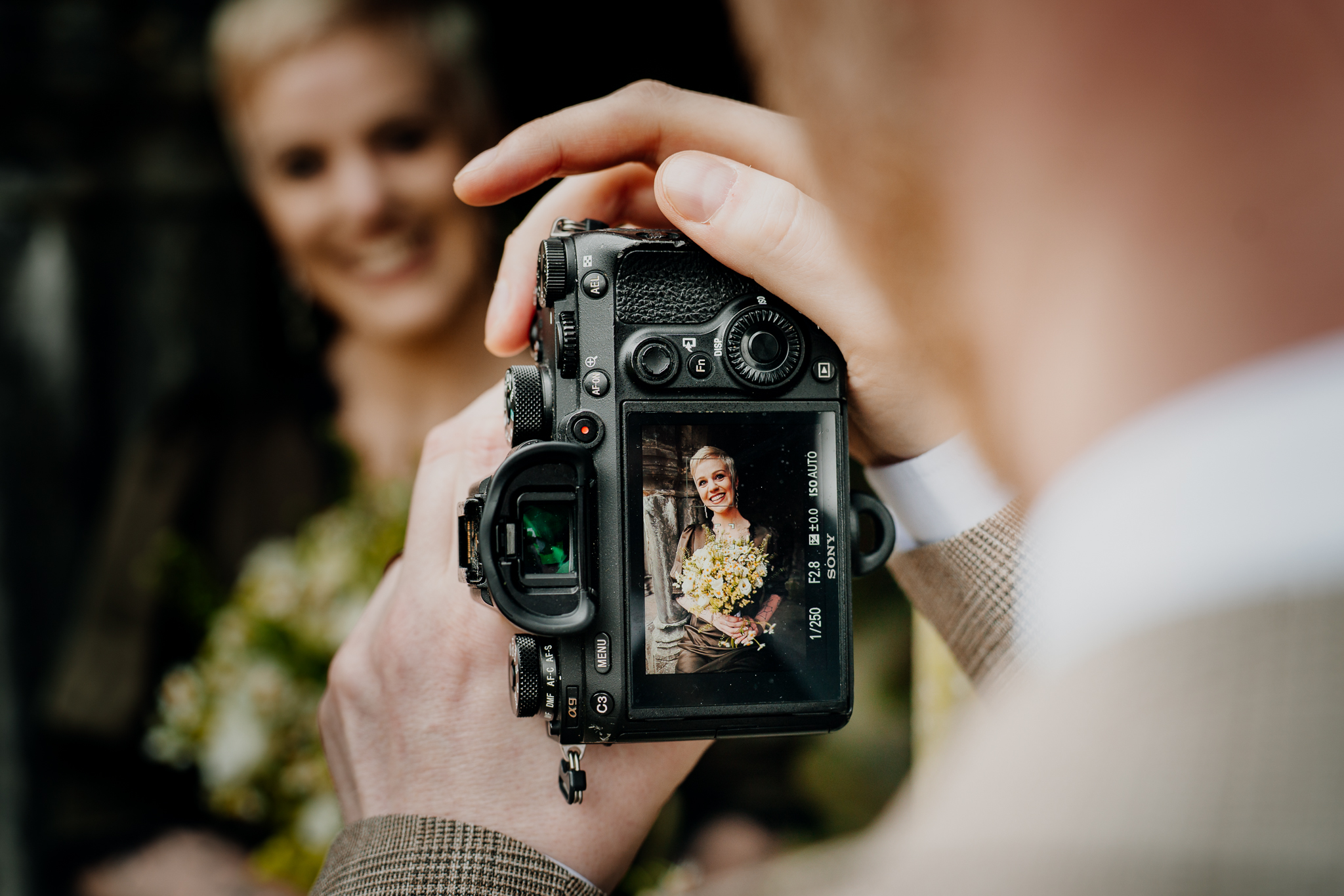 Wedding photographer capturing newlyweds during their Sligo Abbey portrait session