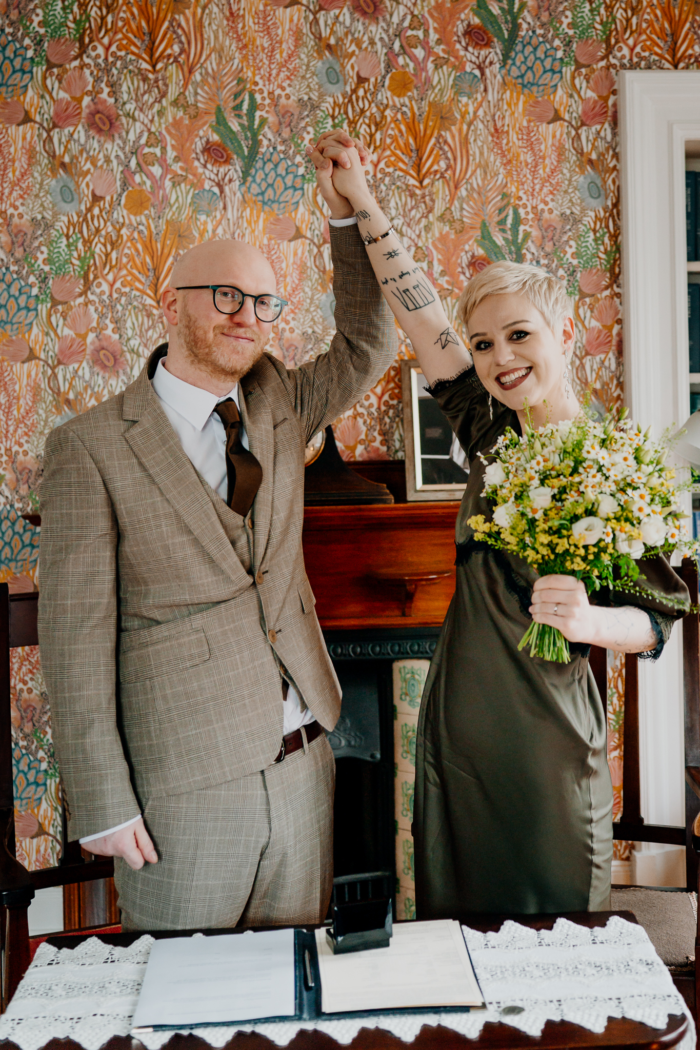 Joyful newlyweds celebrating their intimate wedding at Yeats Society Sligo